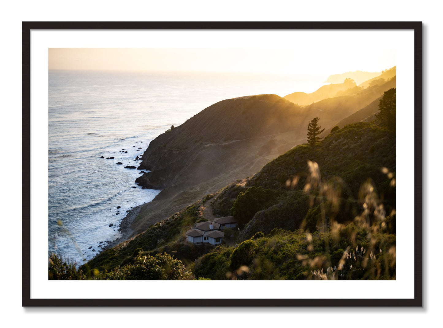Framed photograph of Big Sur Sunset by Dylan Ozanich, Black Walnut frame, Borders
