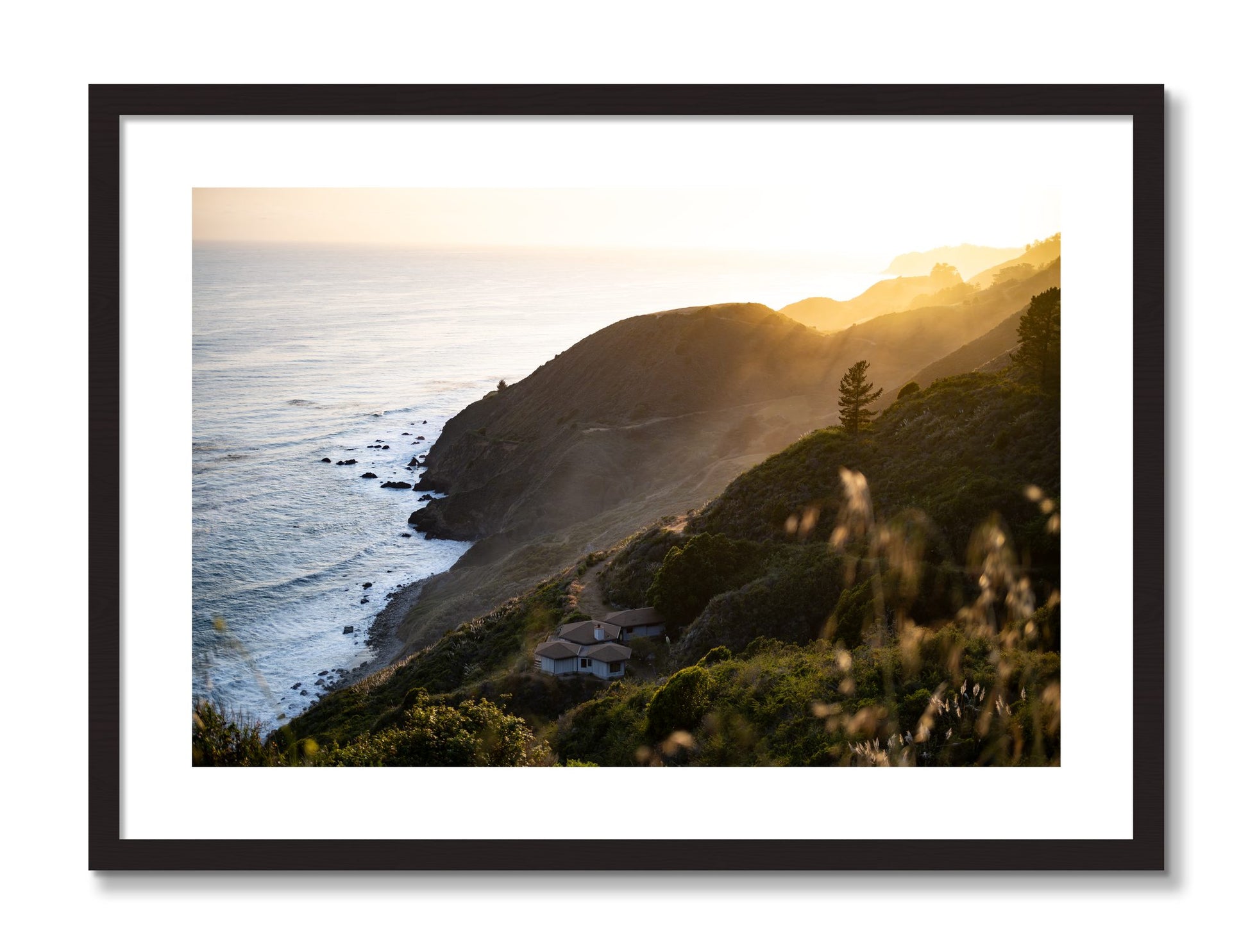 Framed photograph of Big Sur Sunset by Dylan Ozanich, Black Walnut frame, Borders