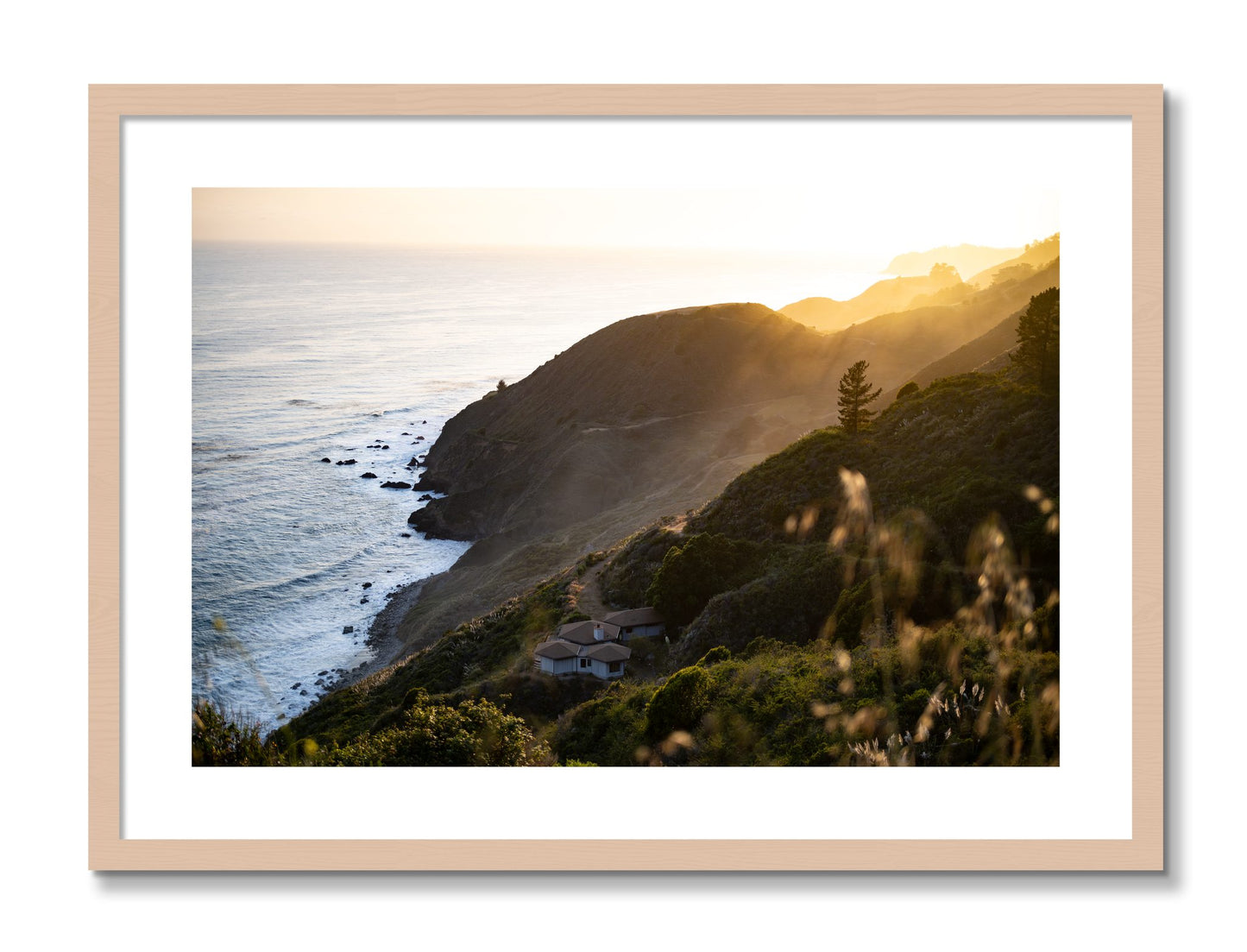 Framed photograph of Big Sur Sunset by Dylan Ozanich, Maple frame, Borders