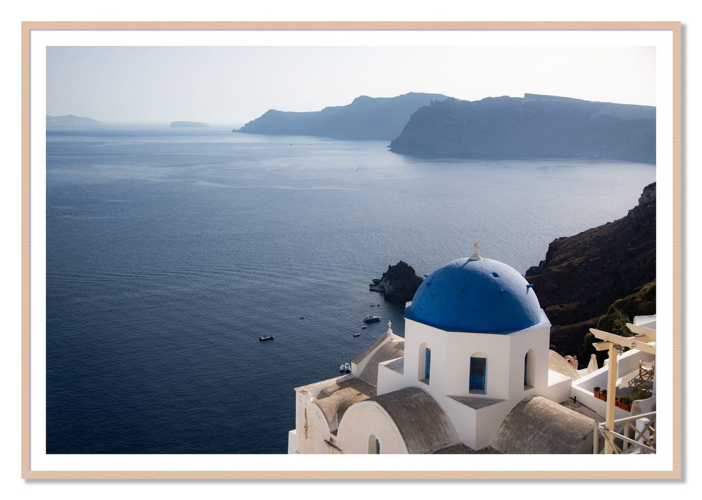 Blue Cap by Dylan Ozanich, 48×72 print with a White Border in a Maple frame