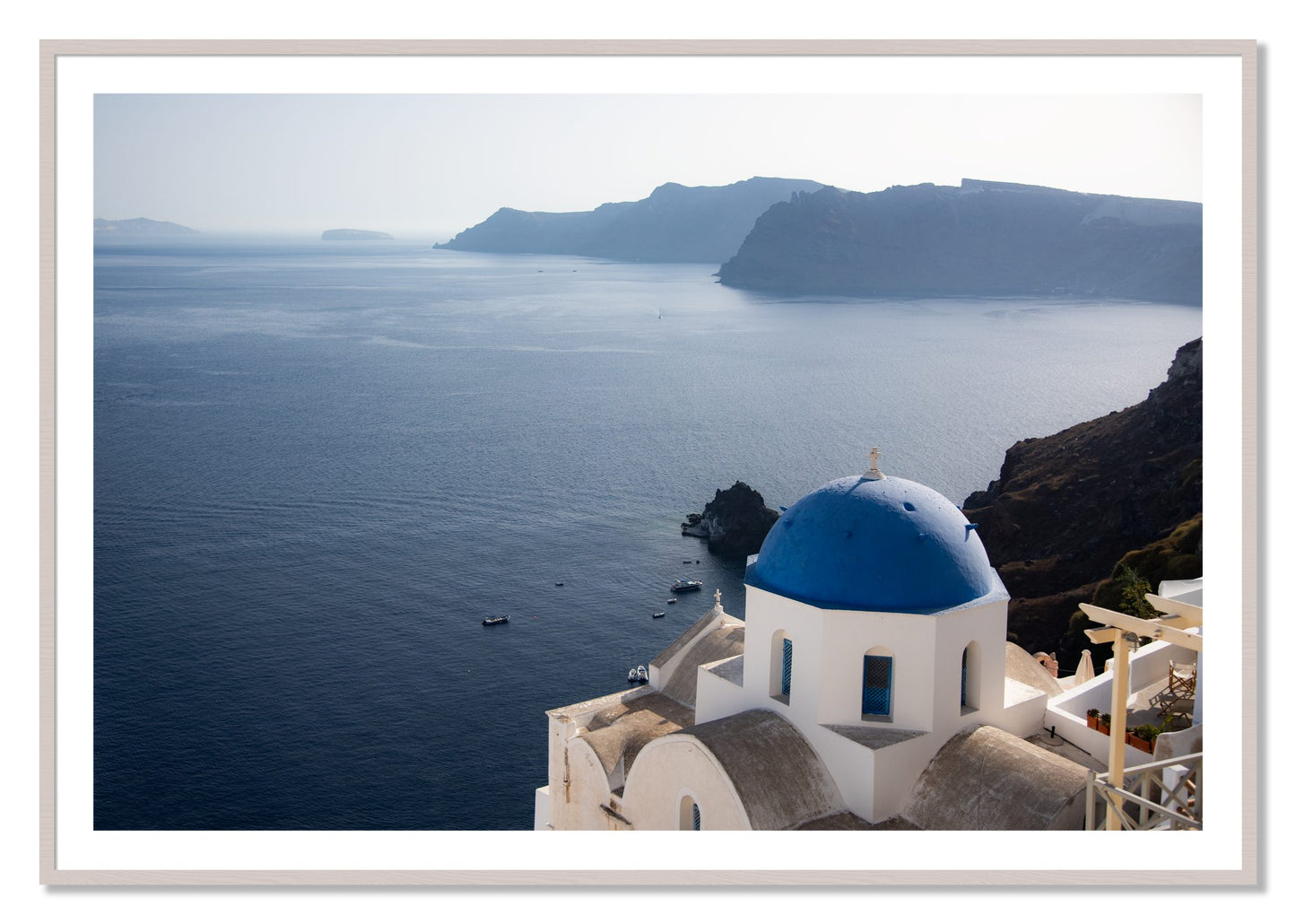 Framed photograph of Blue Cap by Dylan Ozanich, White Maple frame, Borders