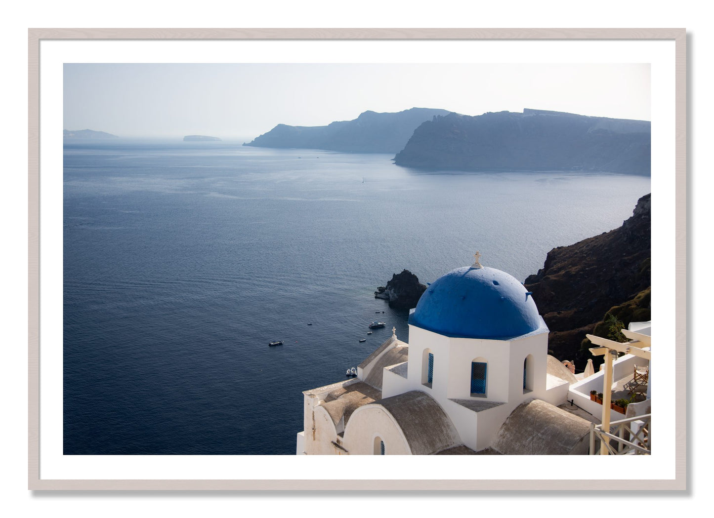 Framed photograph of Blue Cap by Dylan Ozanich, White Maple frame, Borders