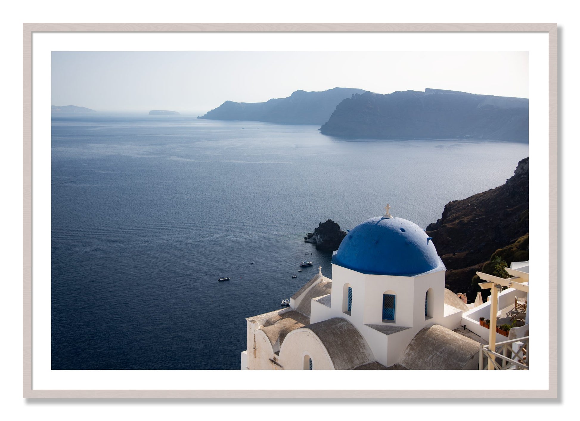 Framed photograph of Blue Cap by Dylan Ozanich, White Maple frame, Borders