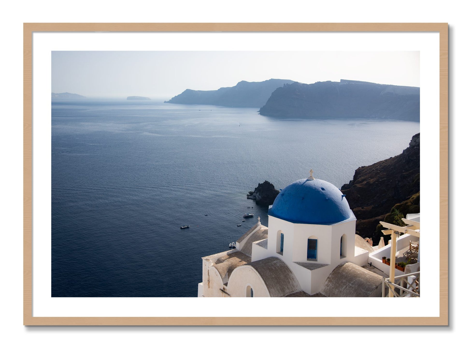 Framed photograph of Blue Cap by Dylan Ozanich, Oak frame, Borders