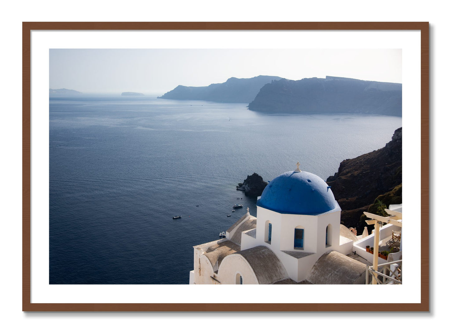 Framed photograph of Blue Cap by Dylan Ozanich, Walnut frame, Borders