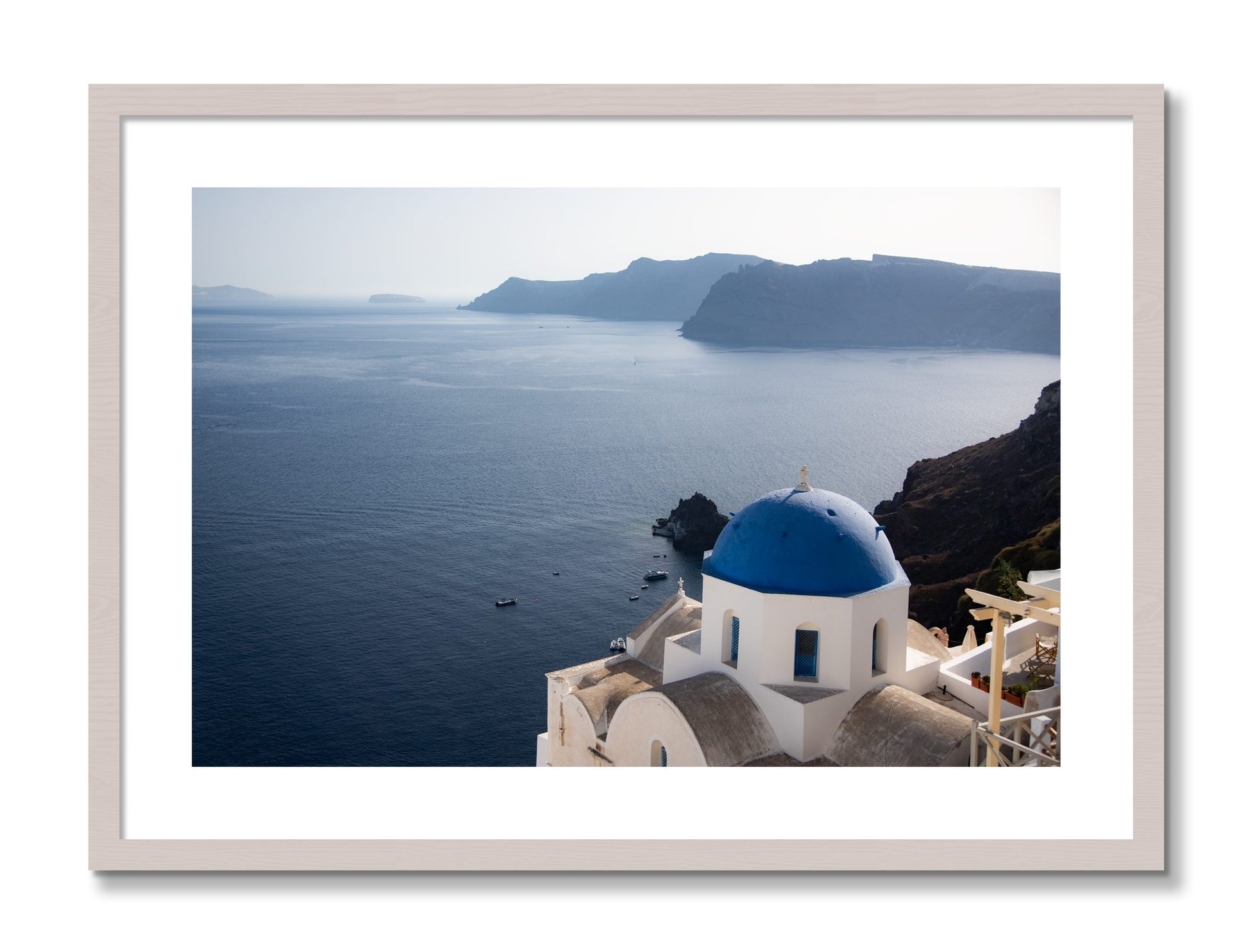 Framed photograph of Blue Cap by Dylan Ozanich, White Maple frame, Borders