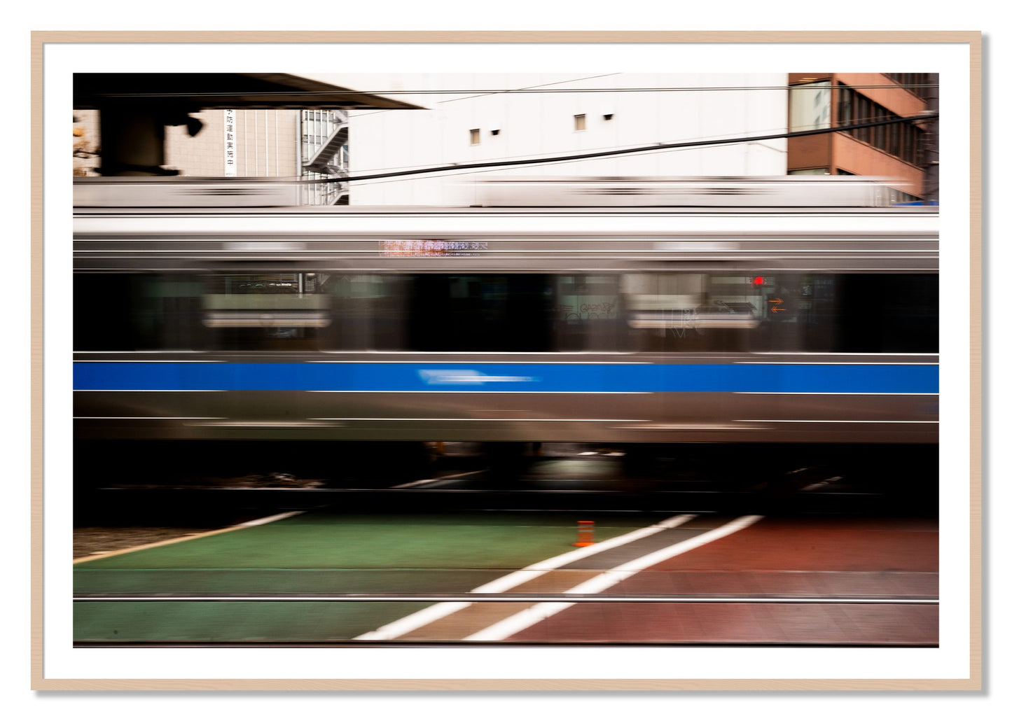 Framed photograph of Blurred Colors by Dylan Ozanich, Maple frame, Borders
