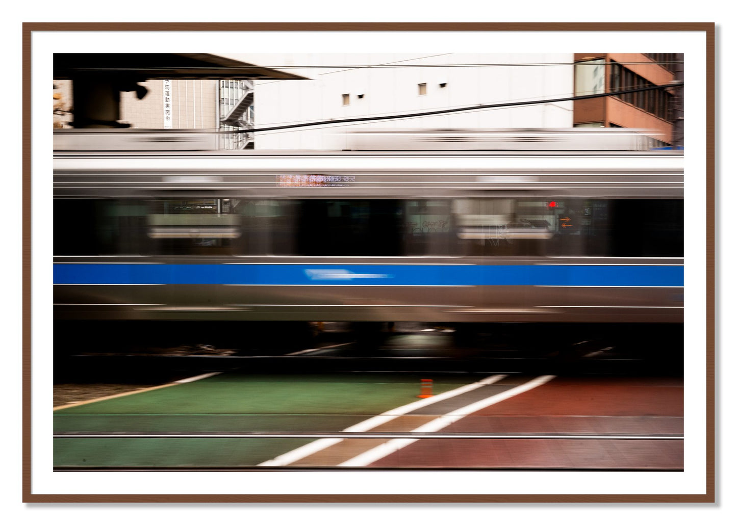 Framed photograph of Blurred Colors by Dylan Ozanich, Walnut frame, Borders