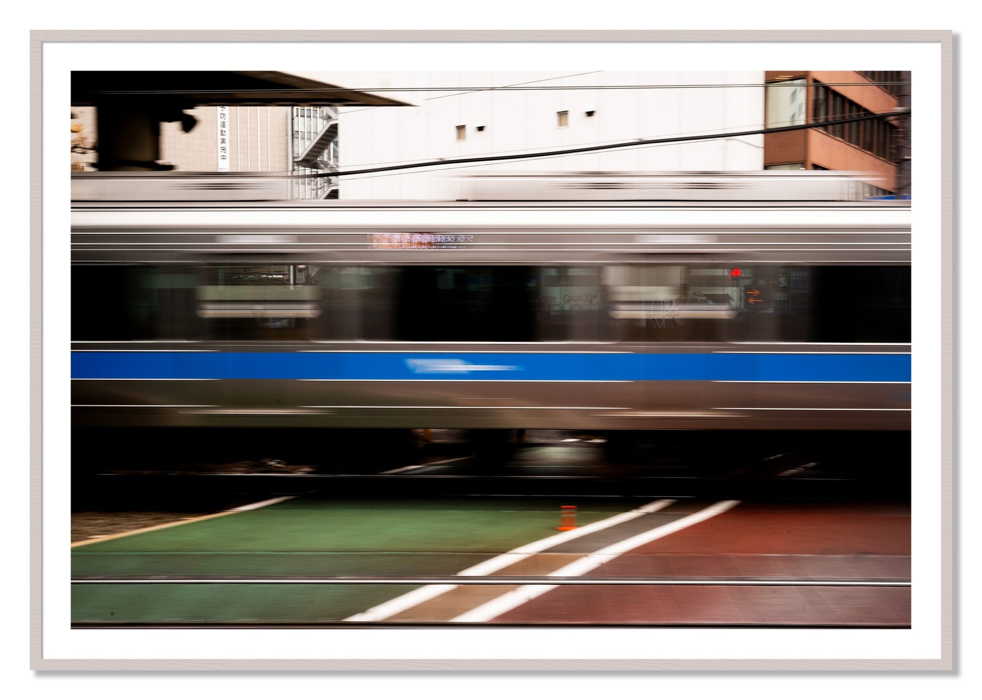 Framed photograph of Blurred Colors by Dylan Ozanich, White Maple frame, Borders