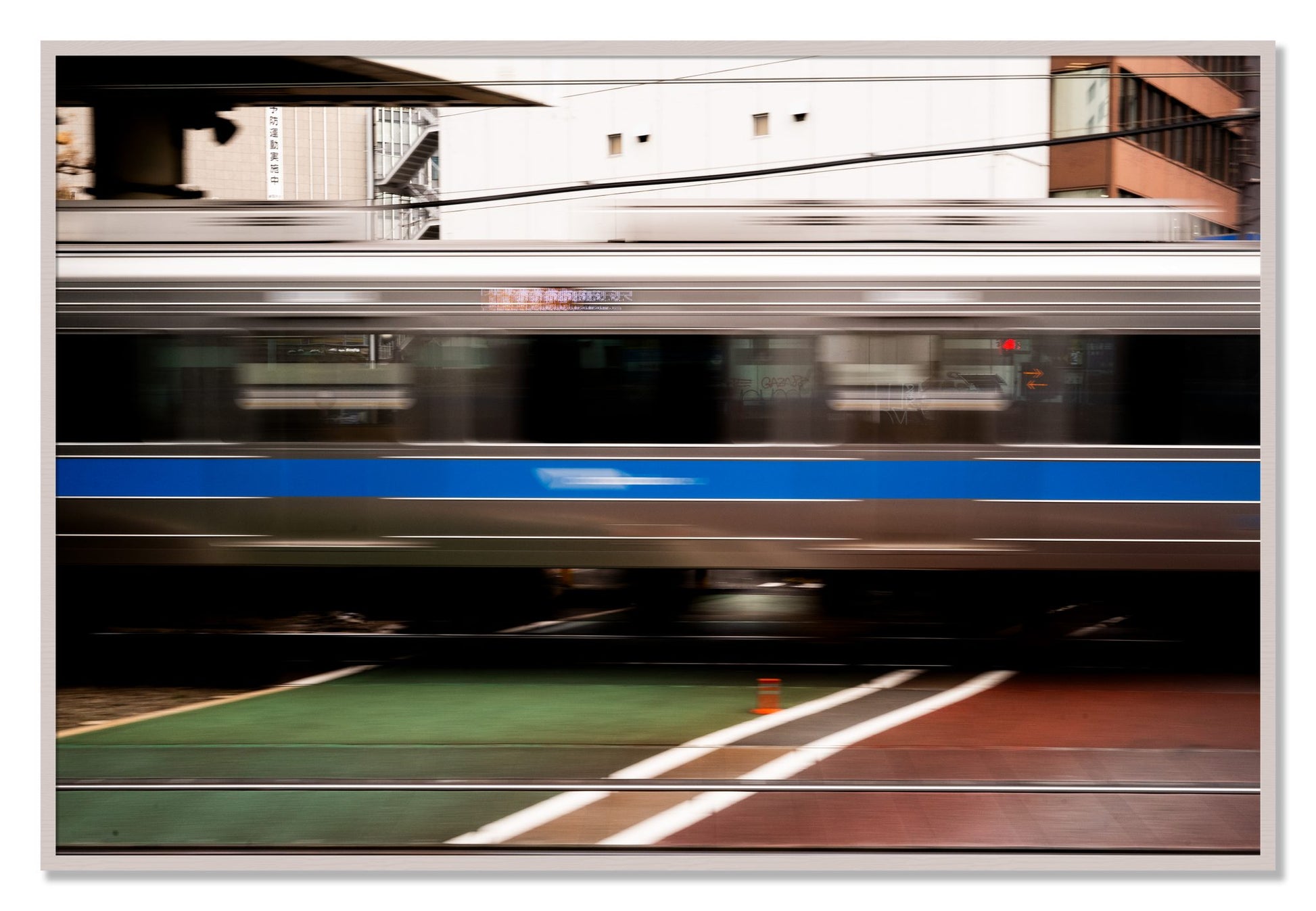 Framed photograph of Blurred Colors by Dylan Ozanich, White Maple frame, Full Bleed
