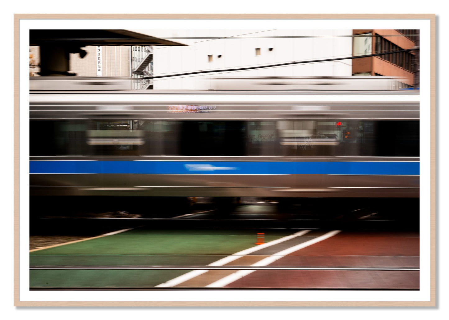 Framed photograph of Blurred Colors by Dylan Ozanich, Maple frame, Borders