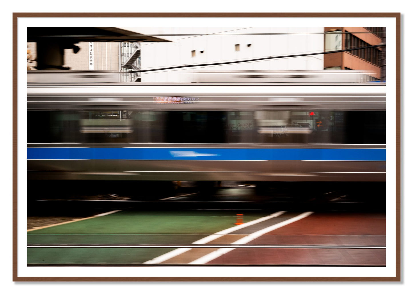 Framed photograph of Blurred Colors by Dylan Ozanich, Walnut frame, Borders