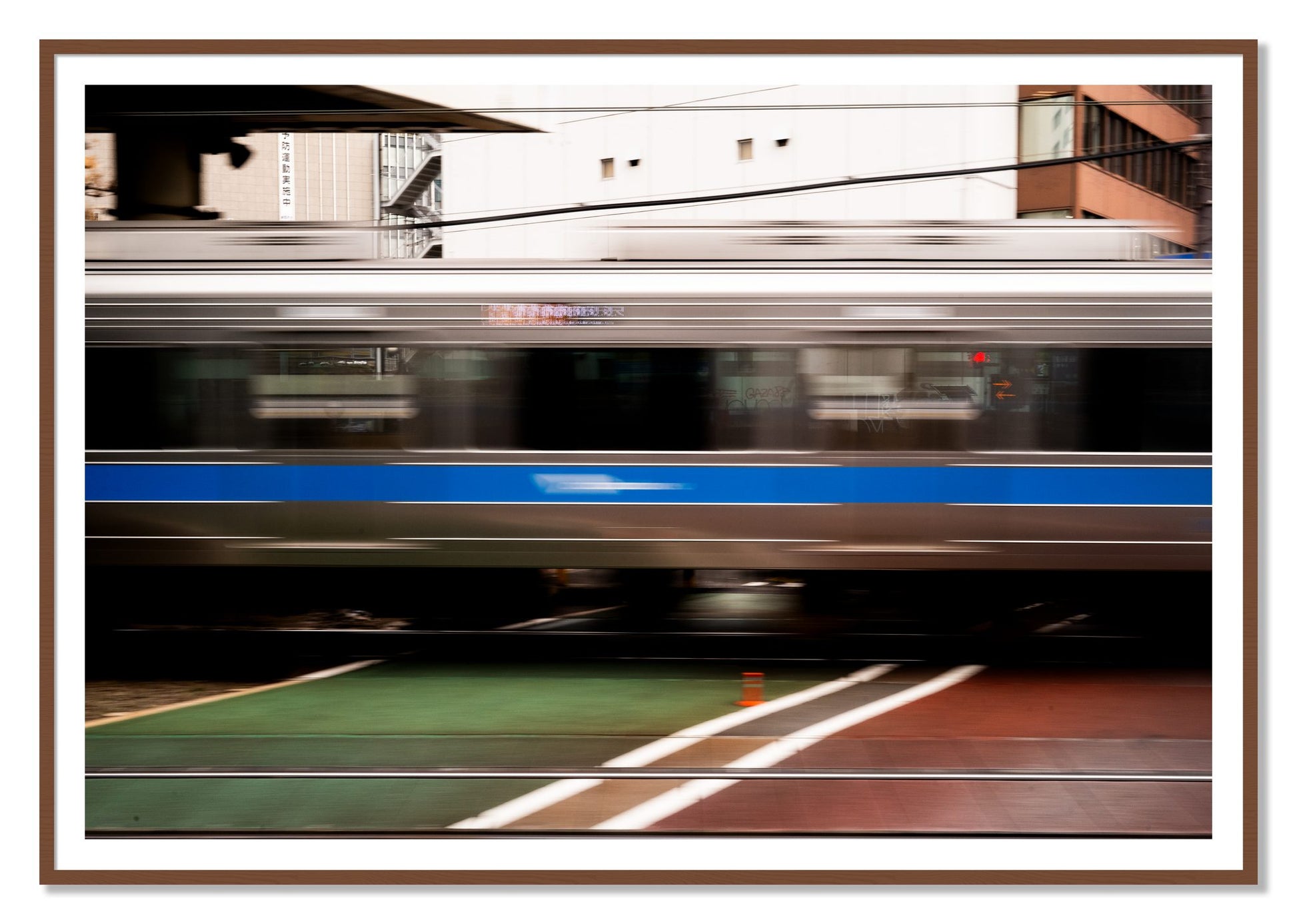 Framed photograph of Blurred Colors by Dylan Ozanich, Walnut frame, Borders