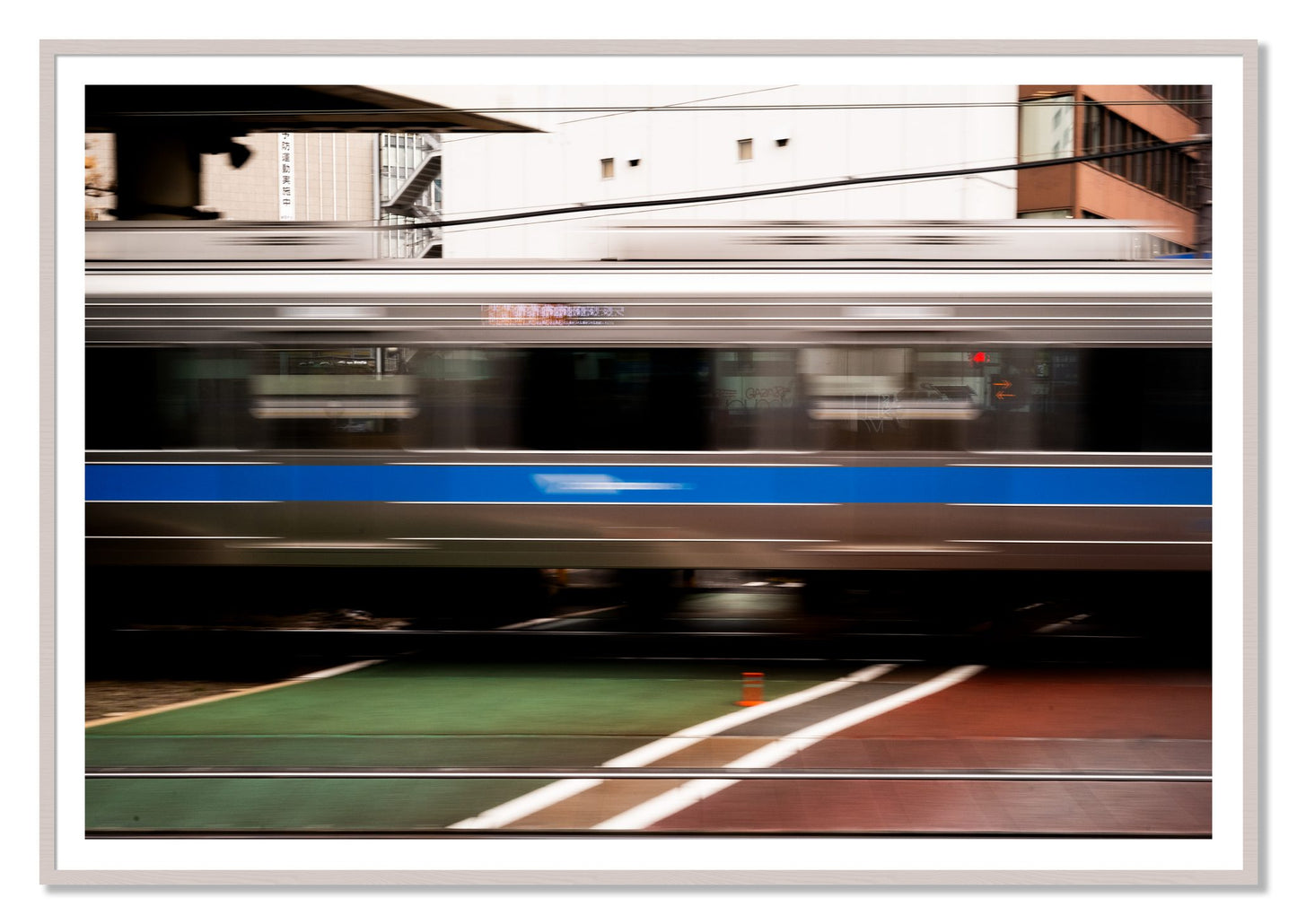 Framed photograph of Blurred Colors by Dylan Ozanich, White Maple frame, Borders