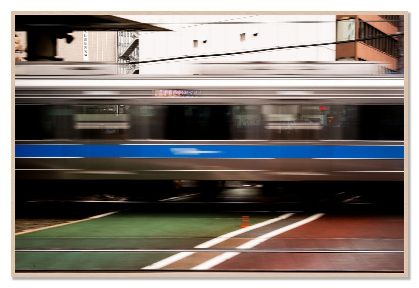 Framed photograph of Blurred Colors by Dylan Ozanich, Maple frame, Full Bleed
