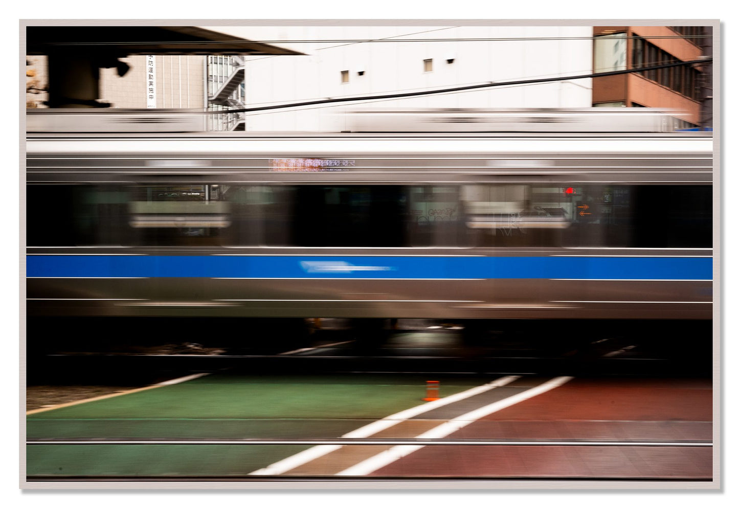 Framed photograph of Blurred Colors by Dylan Ozanich, White Maple frame, Full Bleed