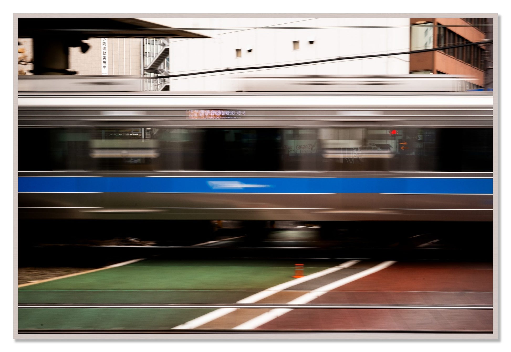 Framed photograph of Blurred Colors by Dylan Ozanich, White Maple frame, Full Bleed