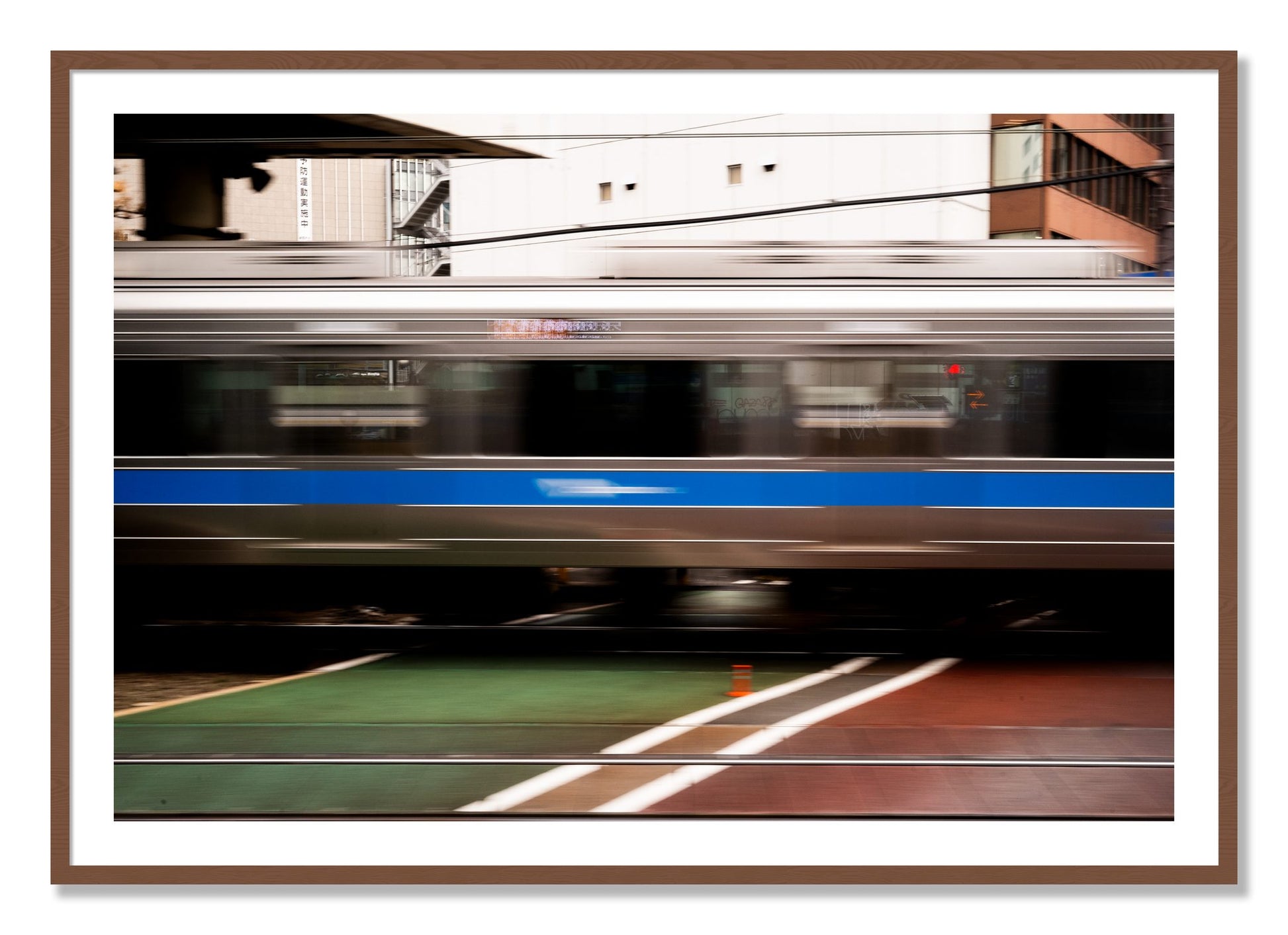 Framed photograph of Blurred Colors by Dylan Ozanich, Walnut frame, Borders