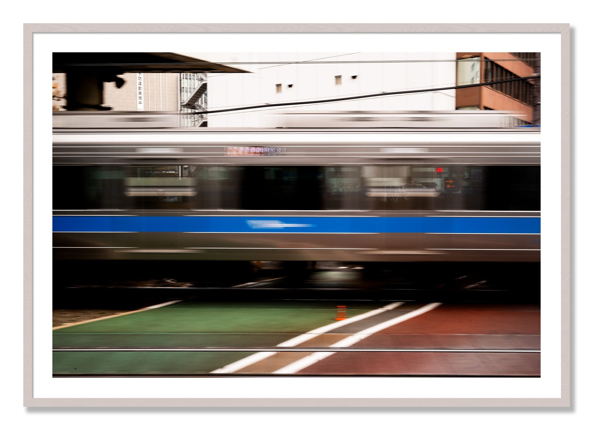 Framed photograph of Blurred Colors by Dylan Ozanich, White Maple frame, Borders
