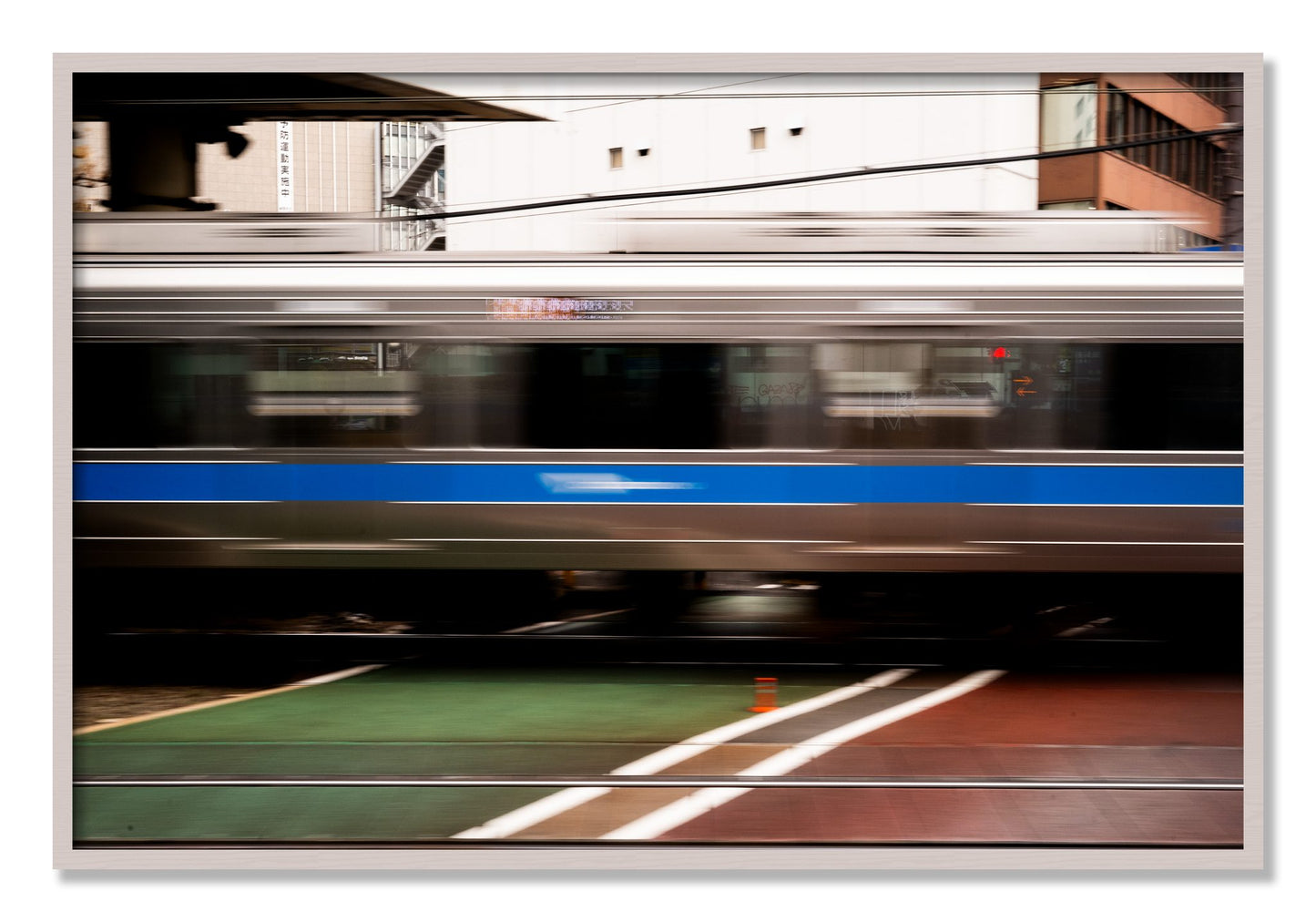 Framed photograph of Blurred Colors by Dylan Ozanich, White Maple frame, Full Bleed