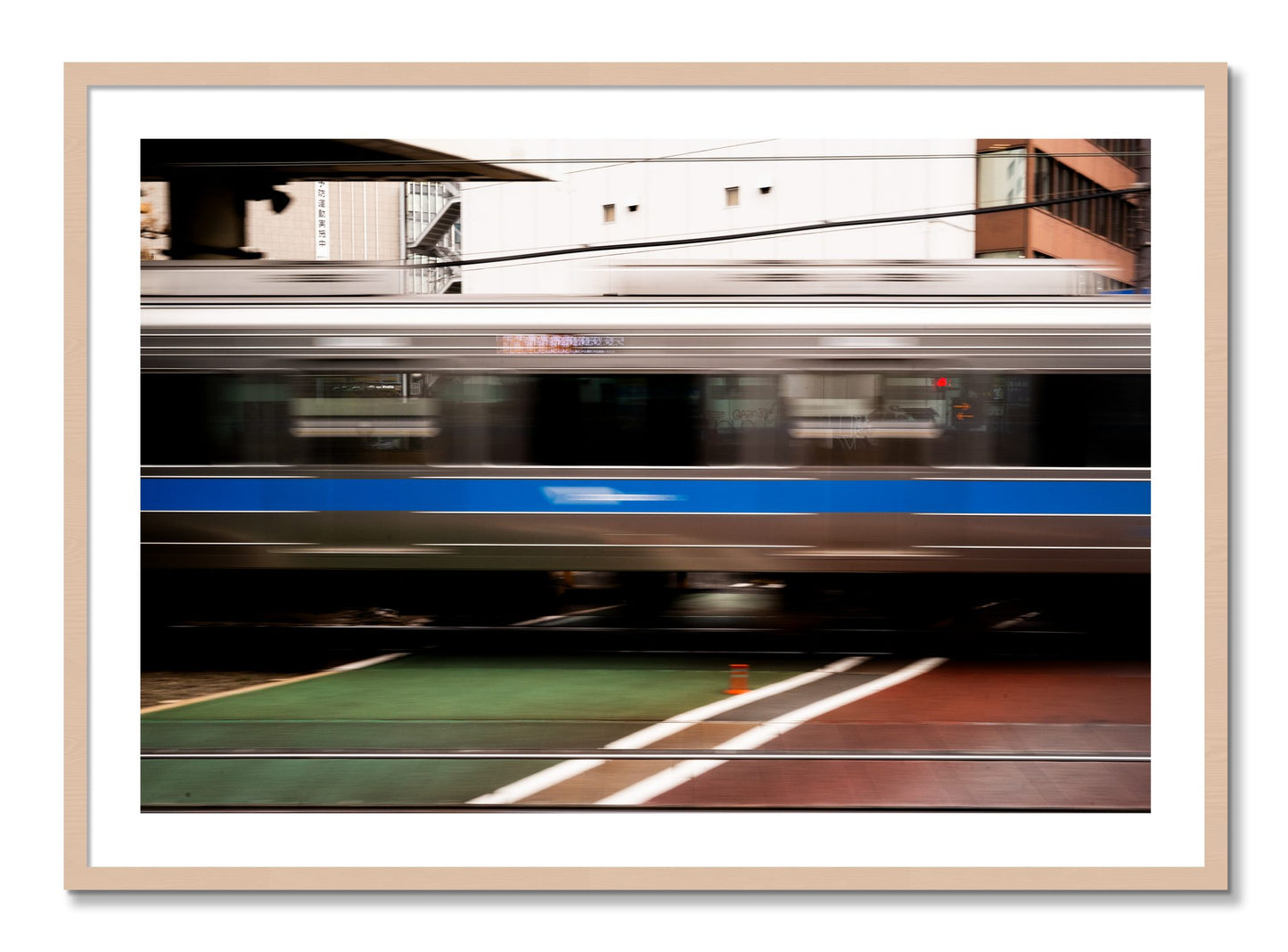 Framed photograph of Blurred Colors by Dylan Ozanich, Maple frame, Borders