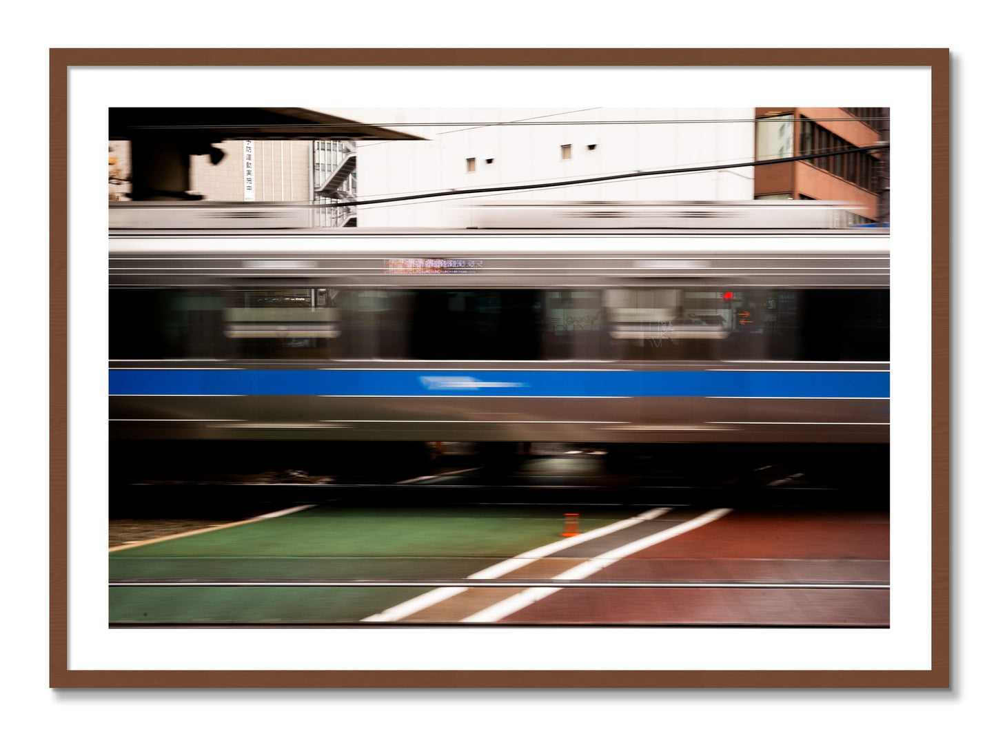 Framed photograph of Blurred Colors by Dylan Ozanich, Walnut frame, Borders