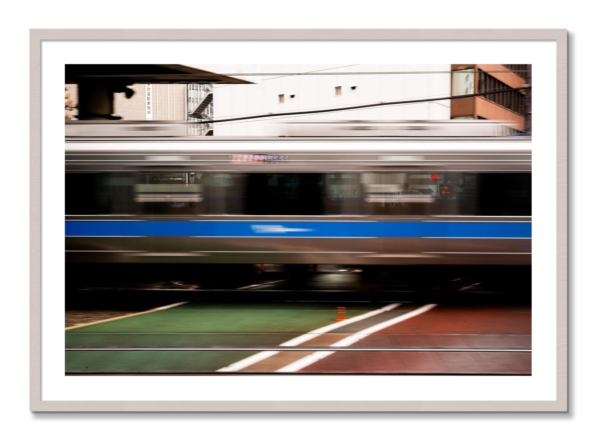 Framed photograph of Blurred Colors by Dylan Ozanich, White Maple frame, Borders