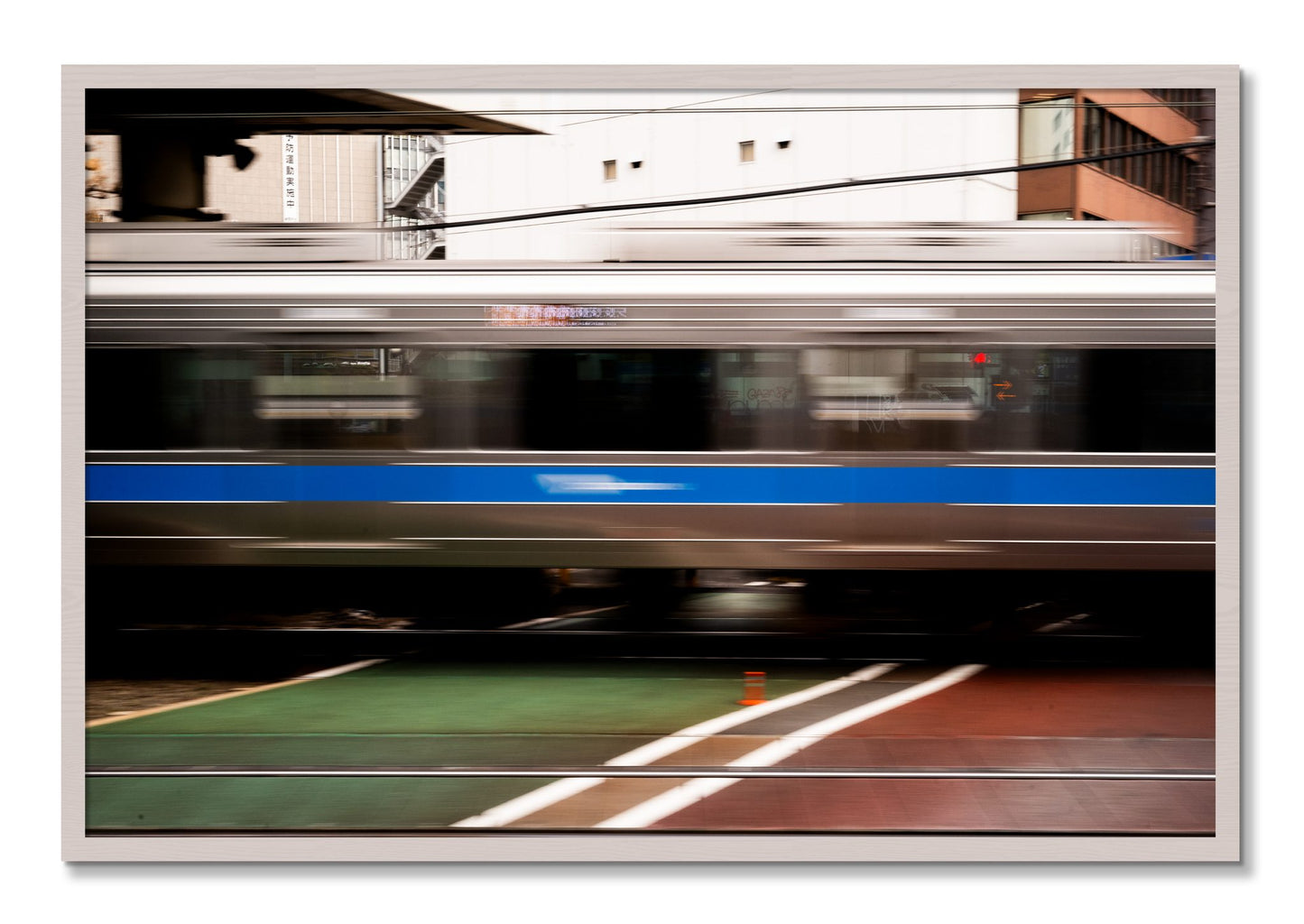 Framed photograph of Blurred Colors by Dylan Ozanich, White Maple frame, Full Bleed