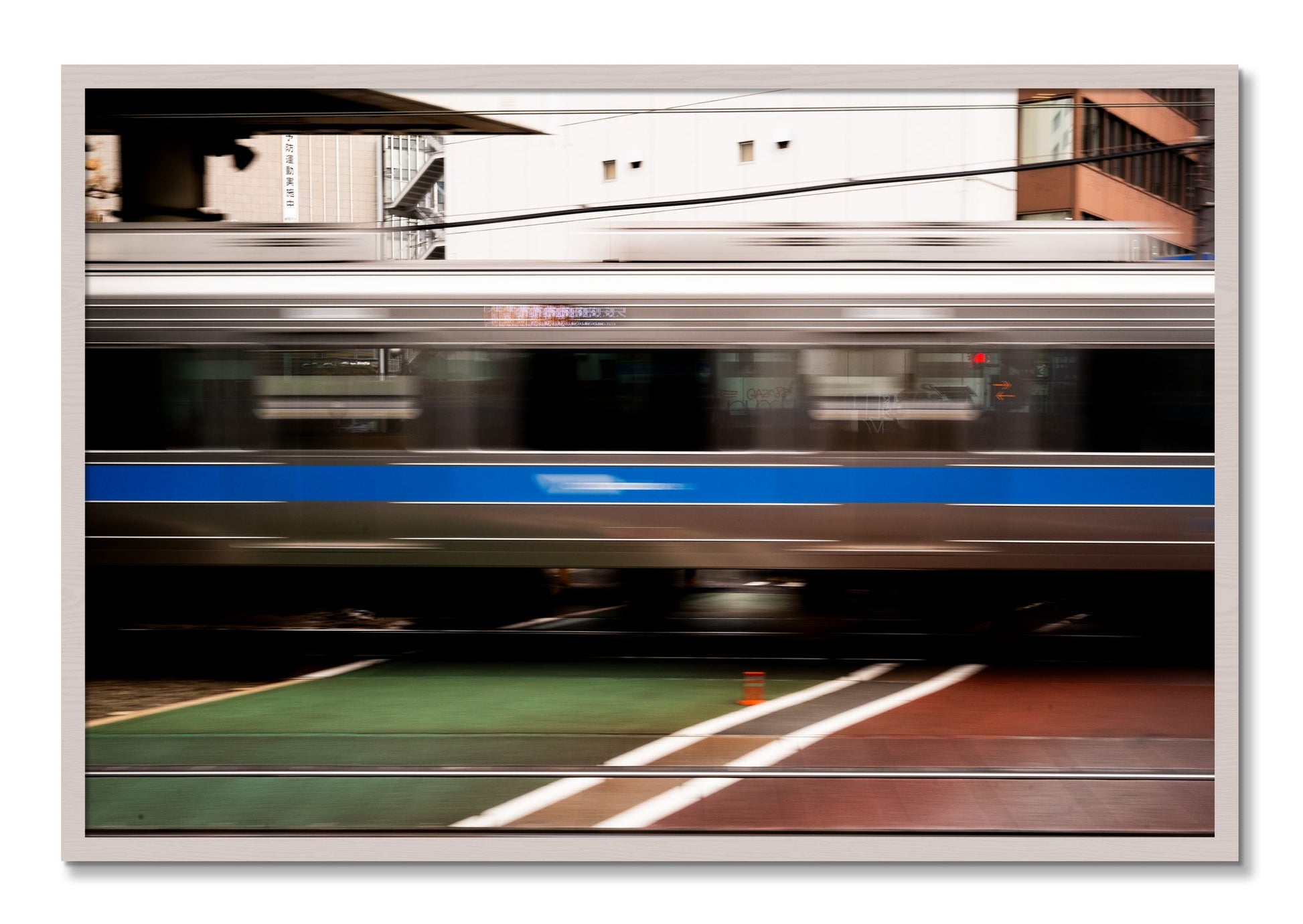 Framed photograph of Blurred Colors by Dylan Ozanich, White Maple frame, Full Bleed