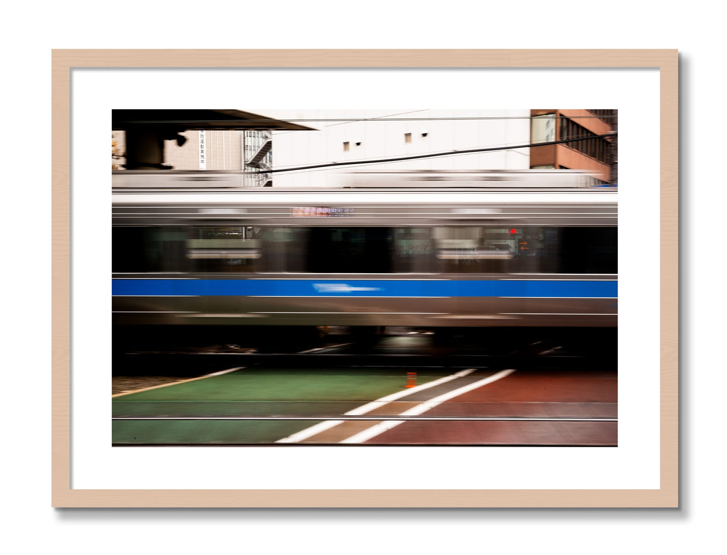 Framed photograph of Blurred Colors by Dylan Ozanich, Maple frame, Borders