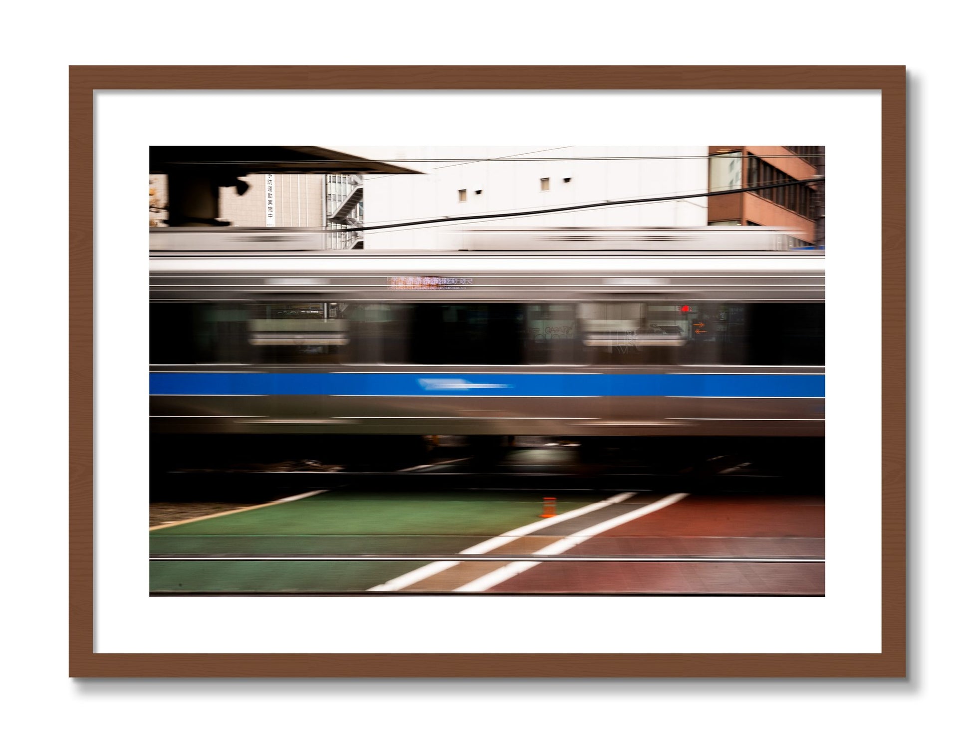 Framed photograph of Blurred Colors by Dylan Ozanich, Walnut frame, Borders