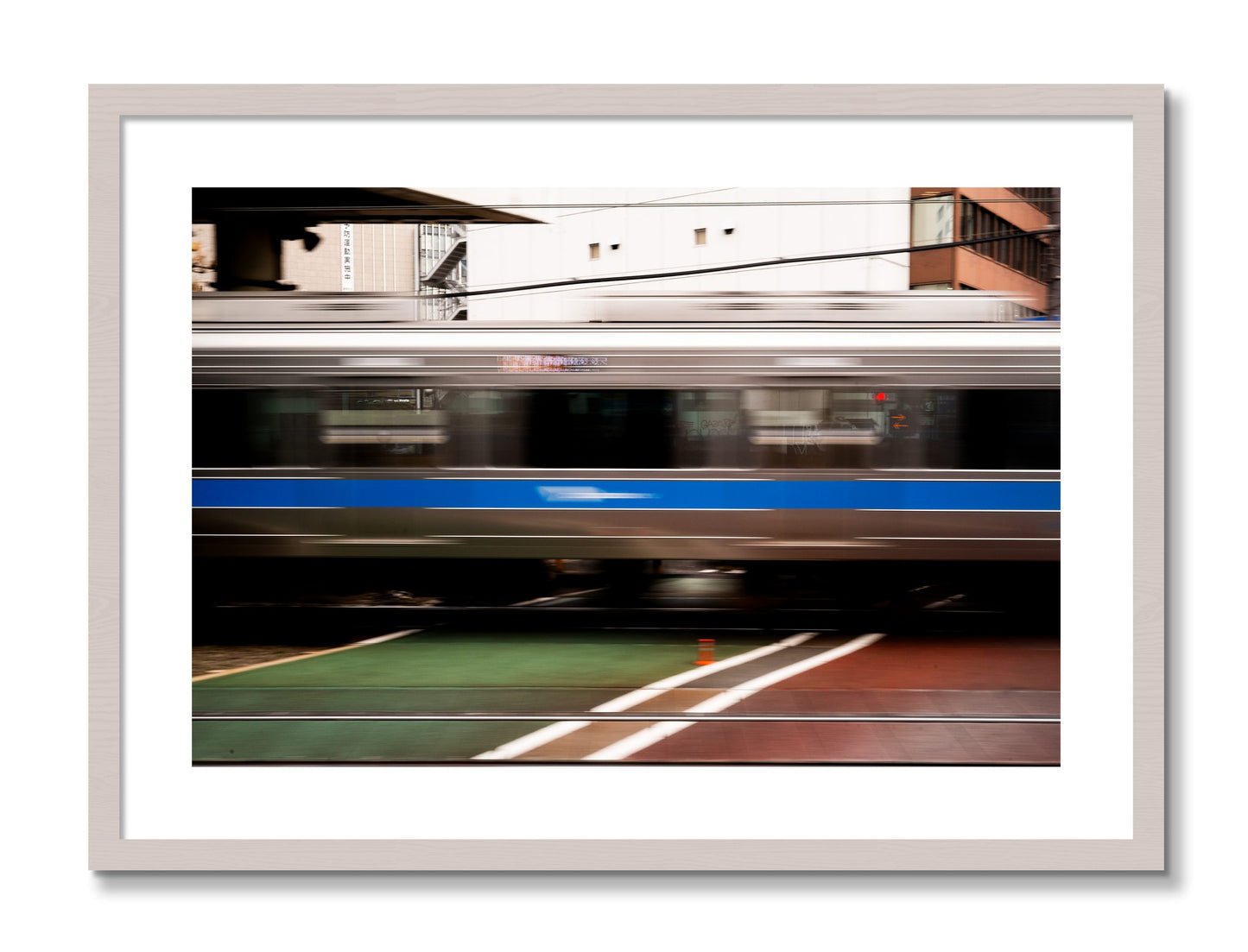 Framed photograph of Blurred Colors by Dylan Ozanich, White Maple frame, Borders