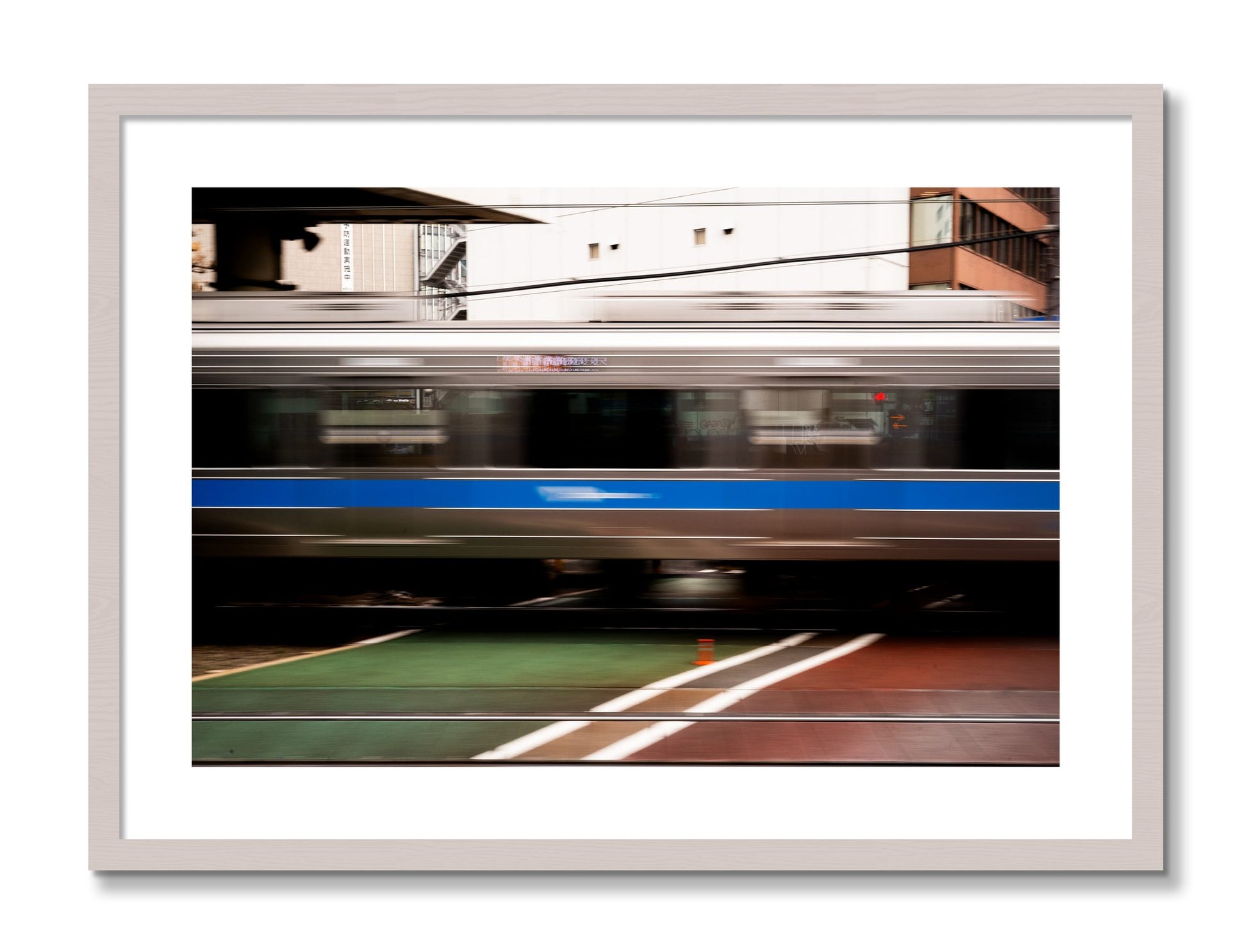 Framed photograph of Blurred Colors by Dylan Ozanich, White Maple frame, Borders