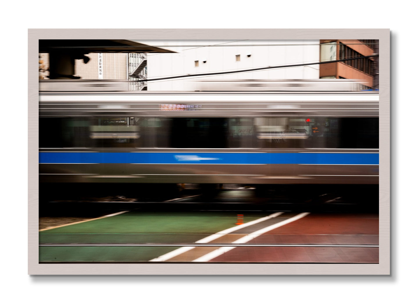 Framed photograph of Blurred Colors by Dylan Ozanich, White Maple frame, Full Bleed