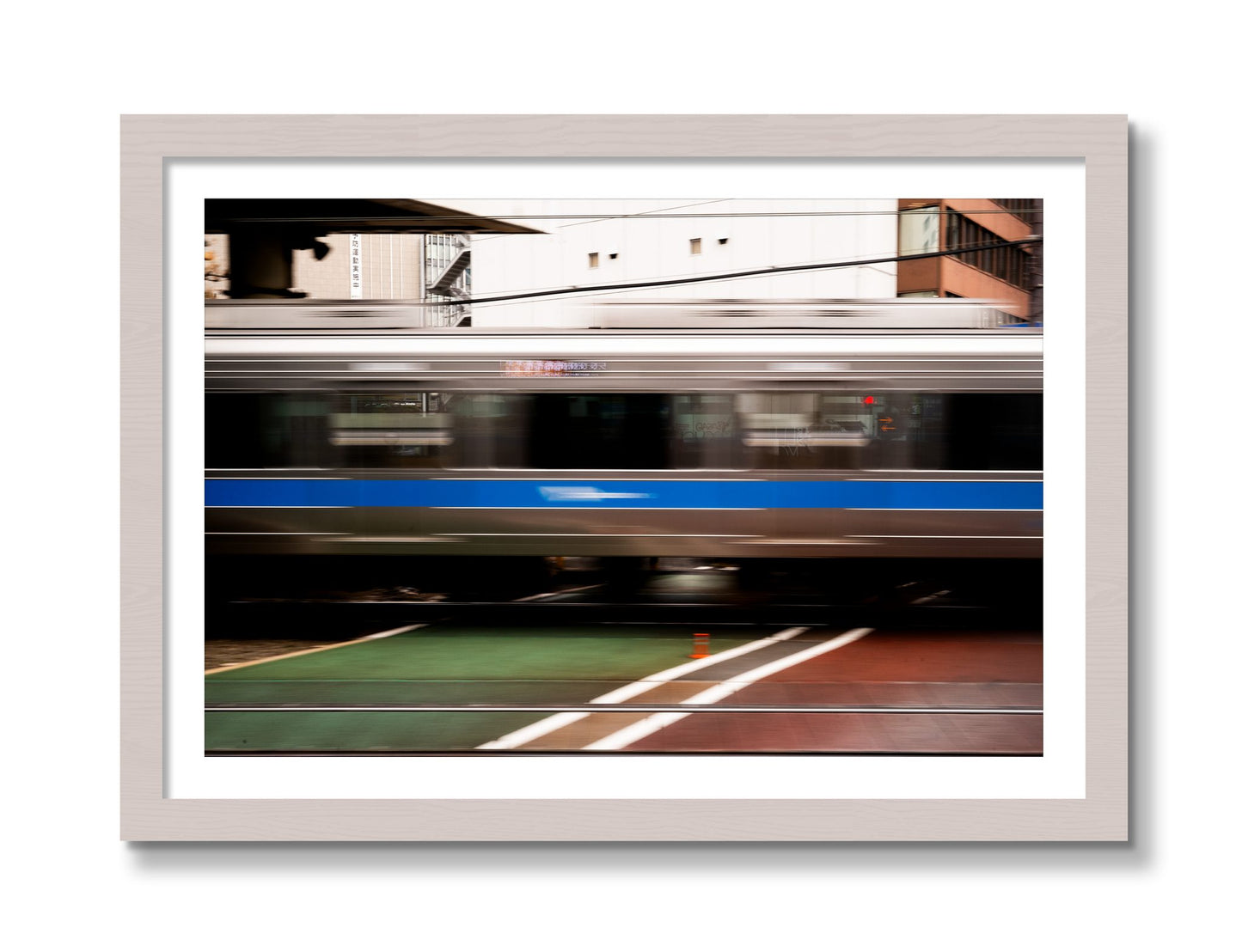 Framed photograph of Blurred Colors by Dylan Ozanich, White Maple frame, Borders