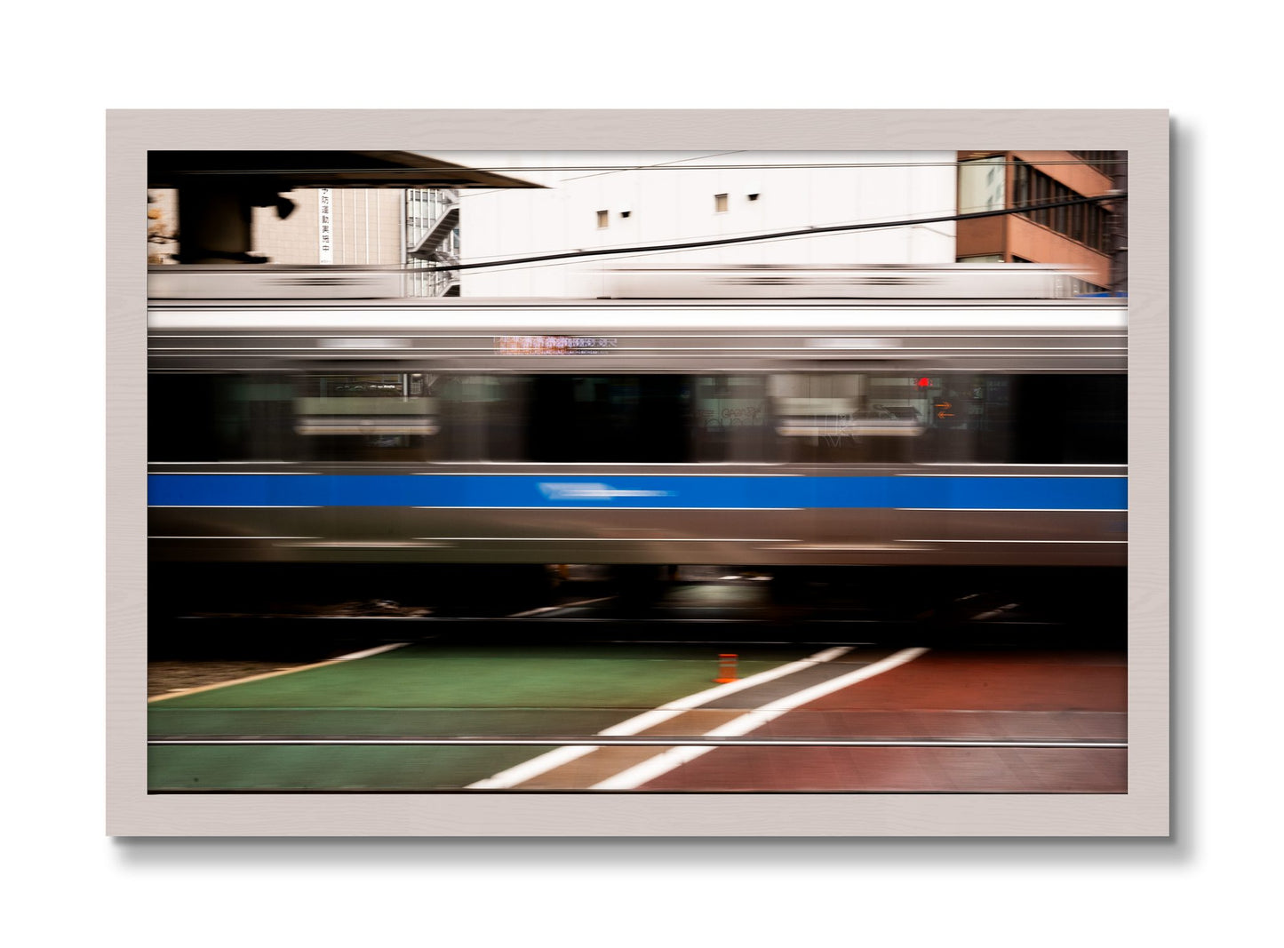 Framed photograph of Blurred Colors by Dylan Ozanich, White Maple frame, Full Bleed