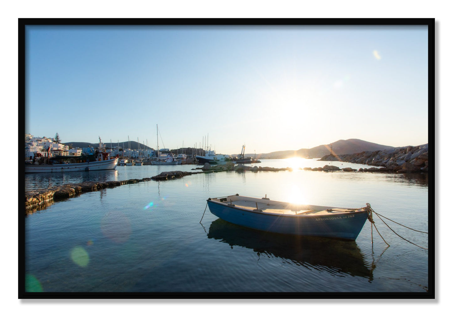 Framed photograph of Boat In Paros by Dylan Ozanich, Black frame, Full Bleed