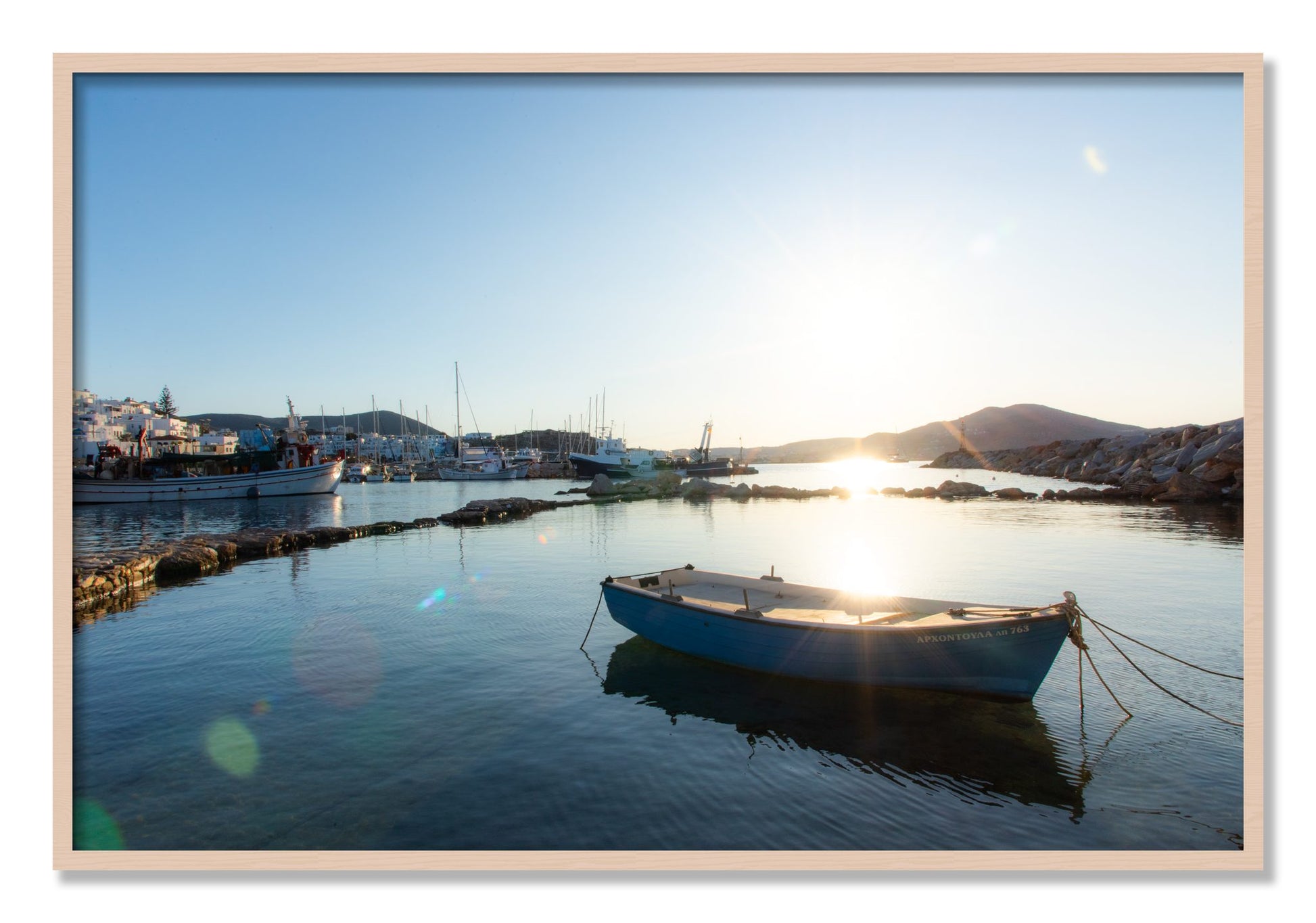 Framed photograph of Boat In Paros by Dylan Ozanich, Maple frame, Full Bleed