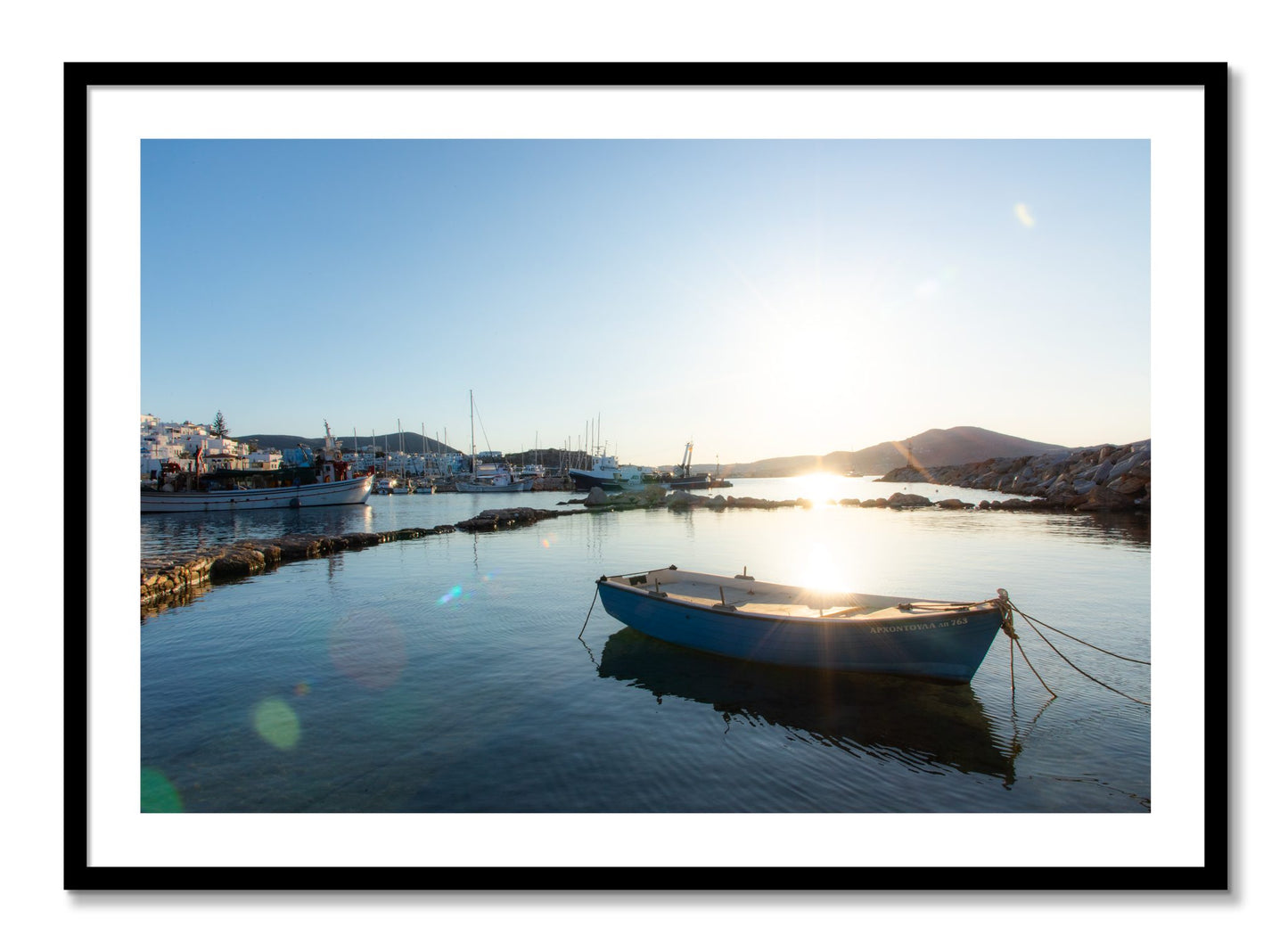 Framed photograph of Boat In Paros by Dylan Ozanich, Black frame, Borders