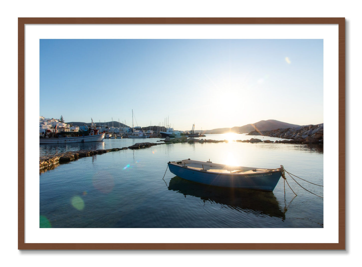 Framed photograph of Boat In Paros by Dylan Ozanich, Walnut frame, Borders
