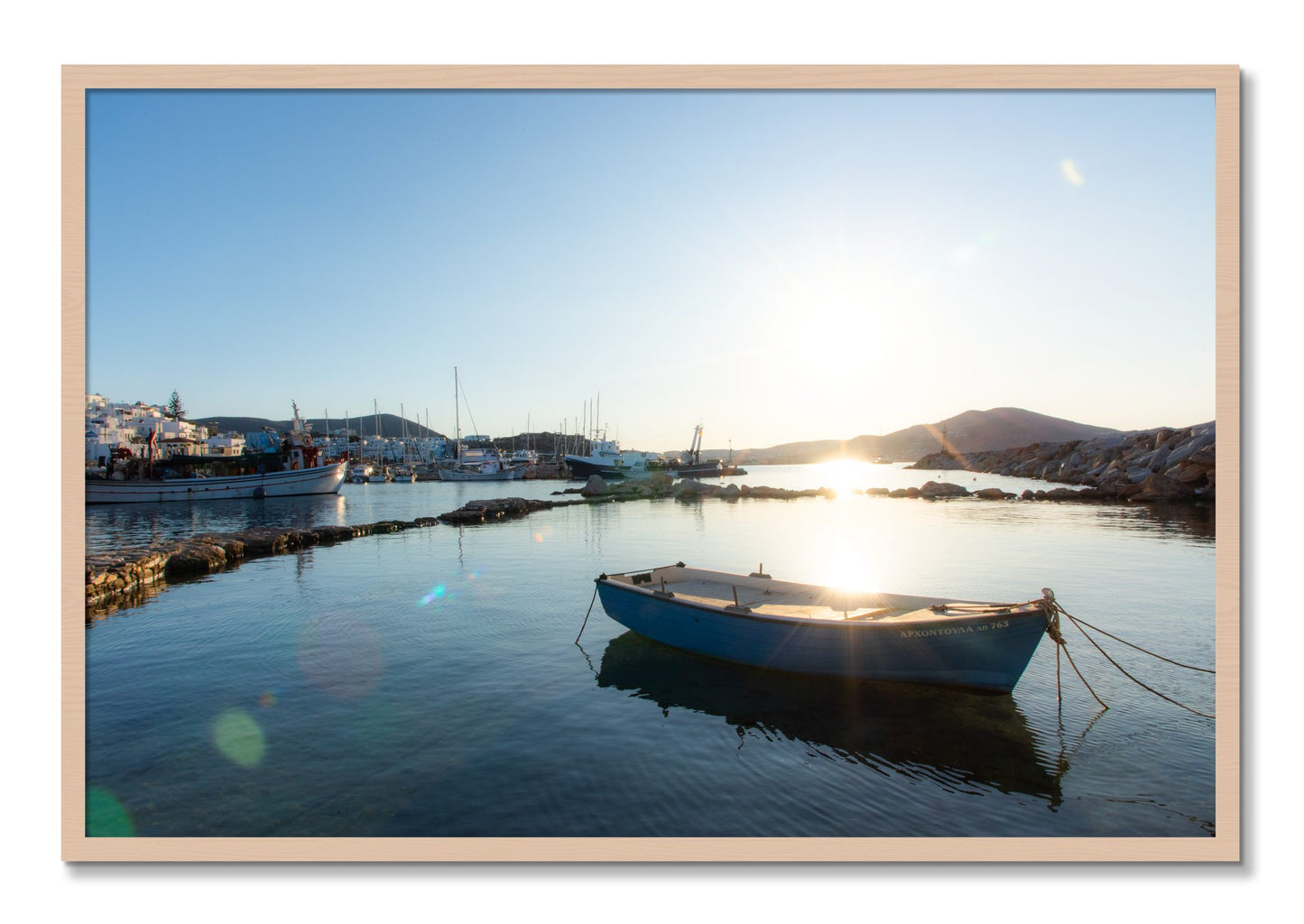 Framed photograph of Boat In Paros by Dylan Ozanich, Maple frame, Full Bleed