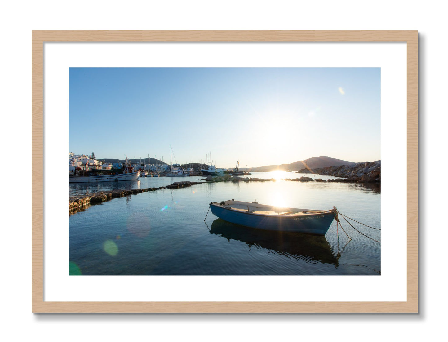 Framed photograph of Boat In Paros by Dylan Ozanich, Oak frame, Borders