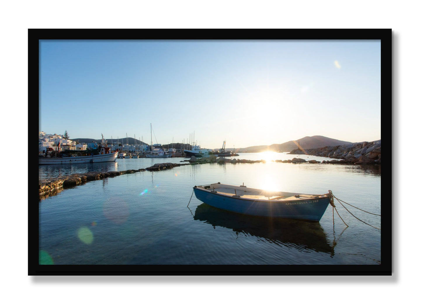 Framed photograph of Boat In Paros by Dylan Ozanich, Black frame, Full Bleed
