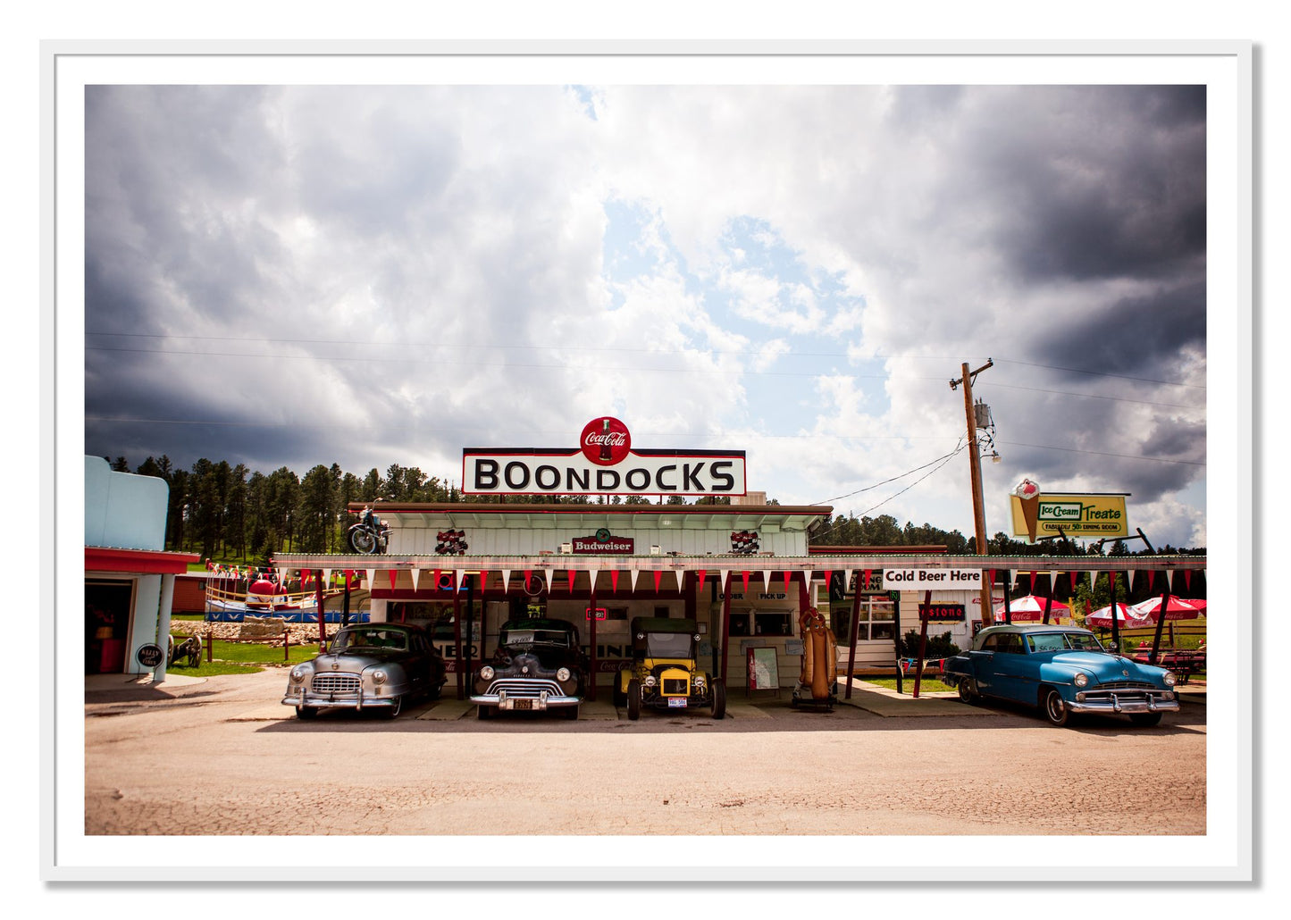 Boondocks by Dylan Ozanich, 48×72 print with a White Border in a White frame
