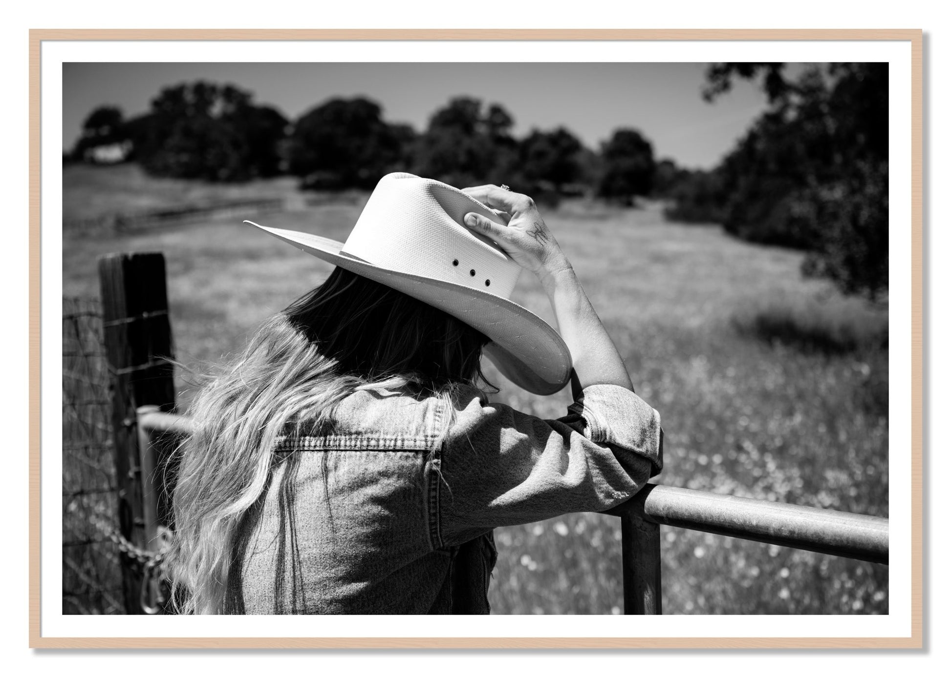 Branded by Dylan Ozanich, 48×72 print with a White Border in a Maple frame