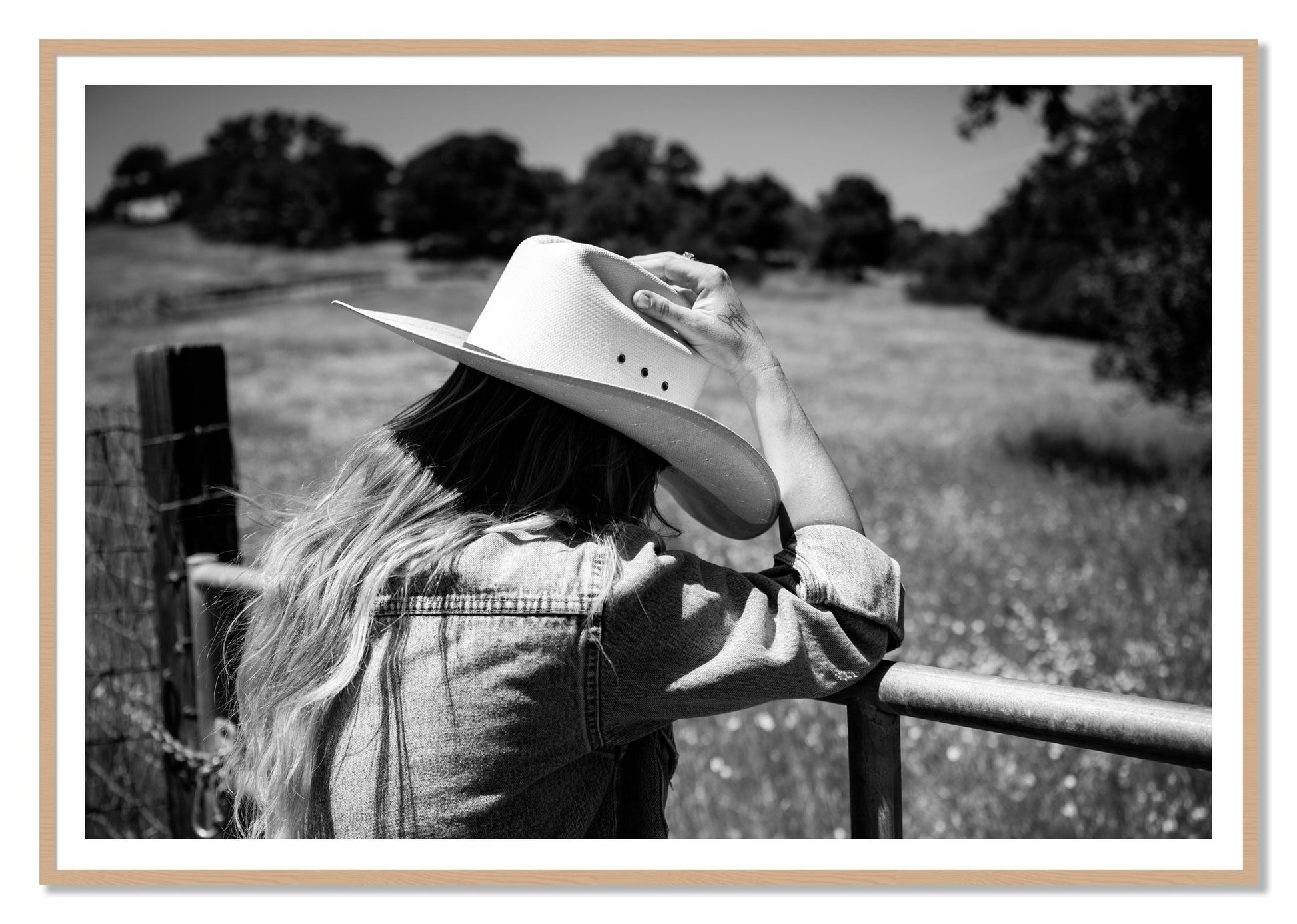 Branded by Dylan Ozanich, 48×72 print with a White Border in an Oak frame