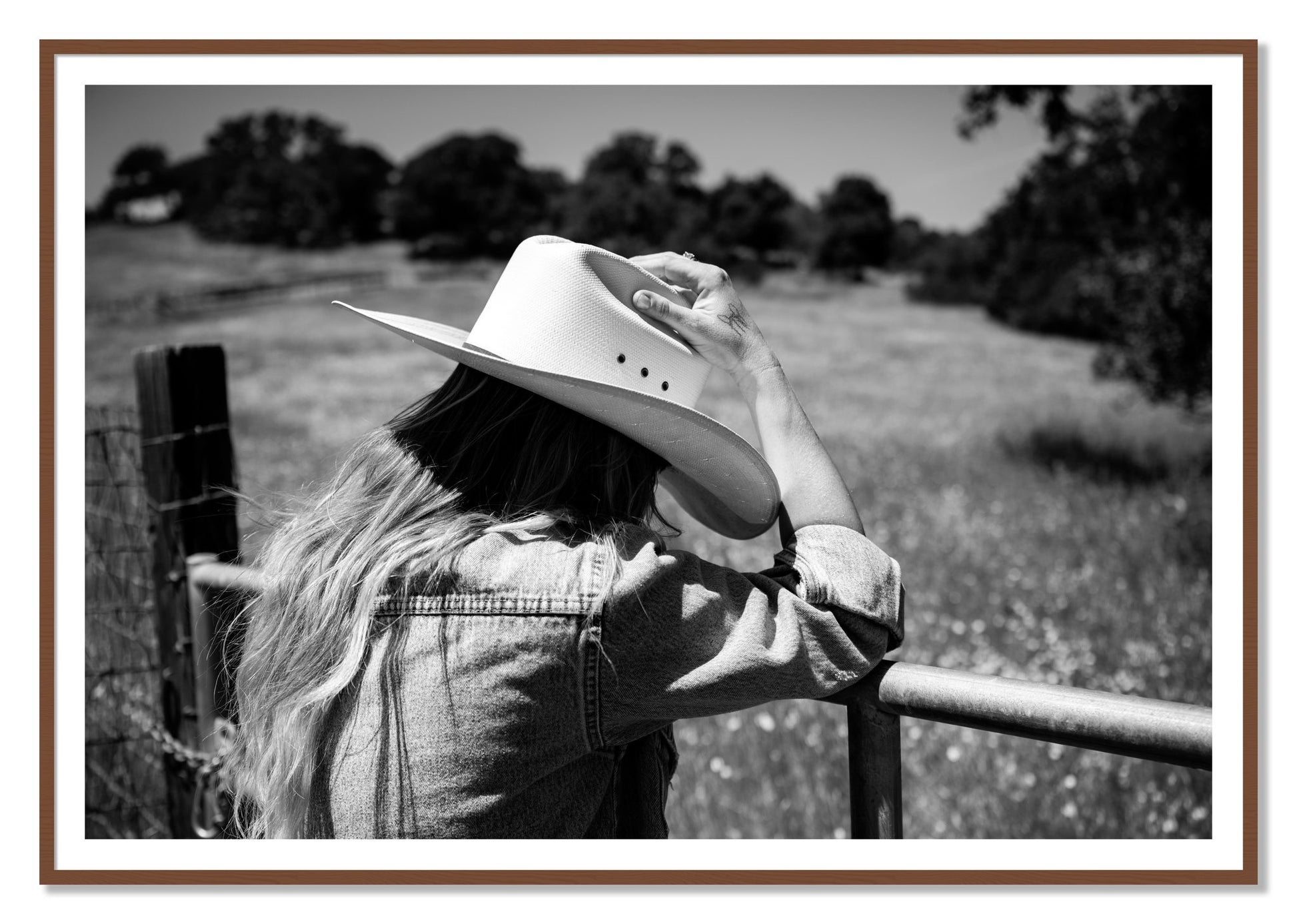 Branded by Dylan Ozanich, 48×72 print with a White Border in a Walnut frame