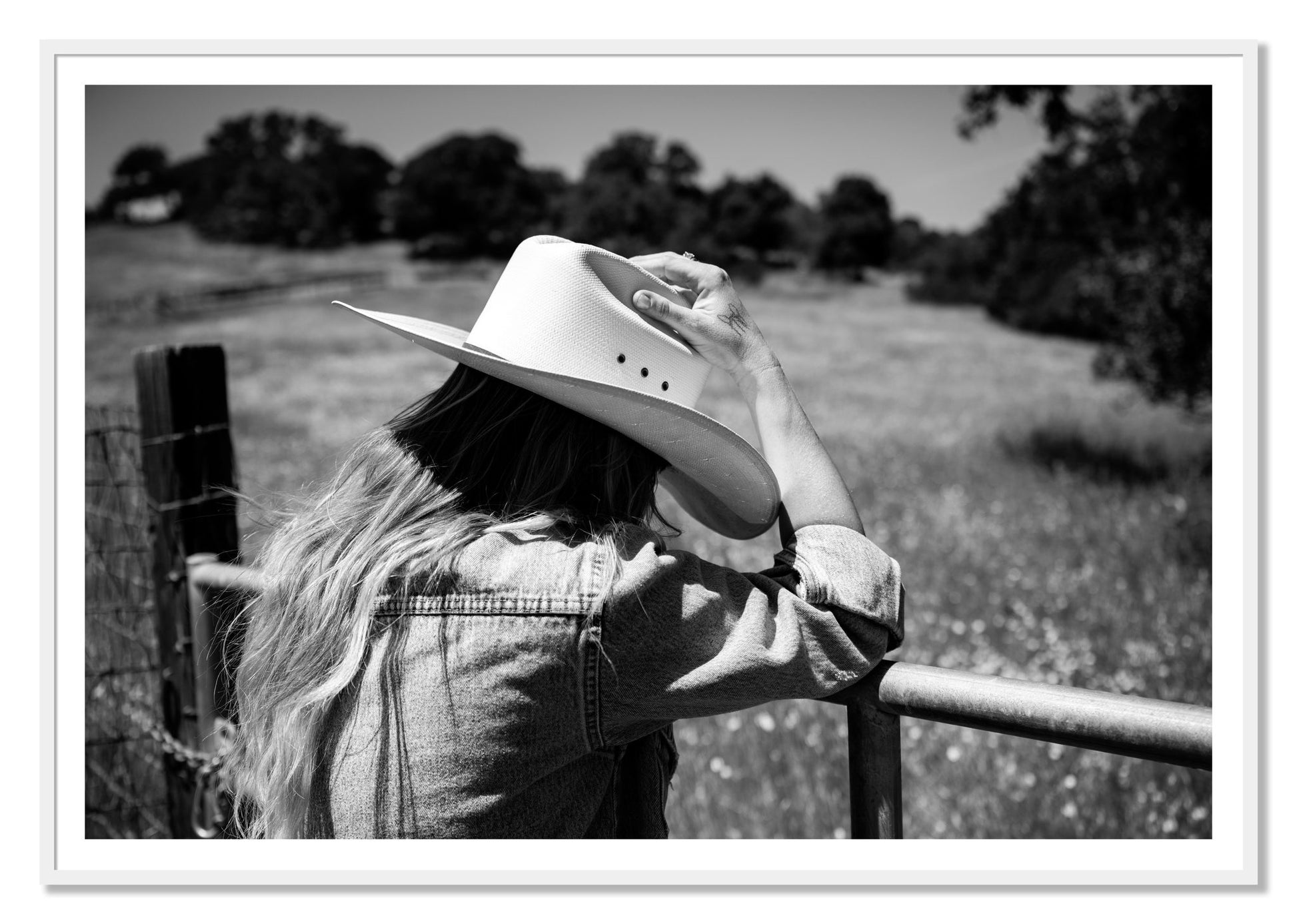 Branded by Dylan Ozanich, 48×72 print with a White Border in a White frame