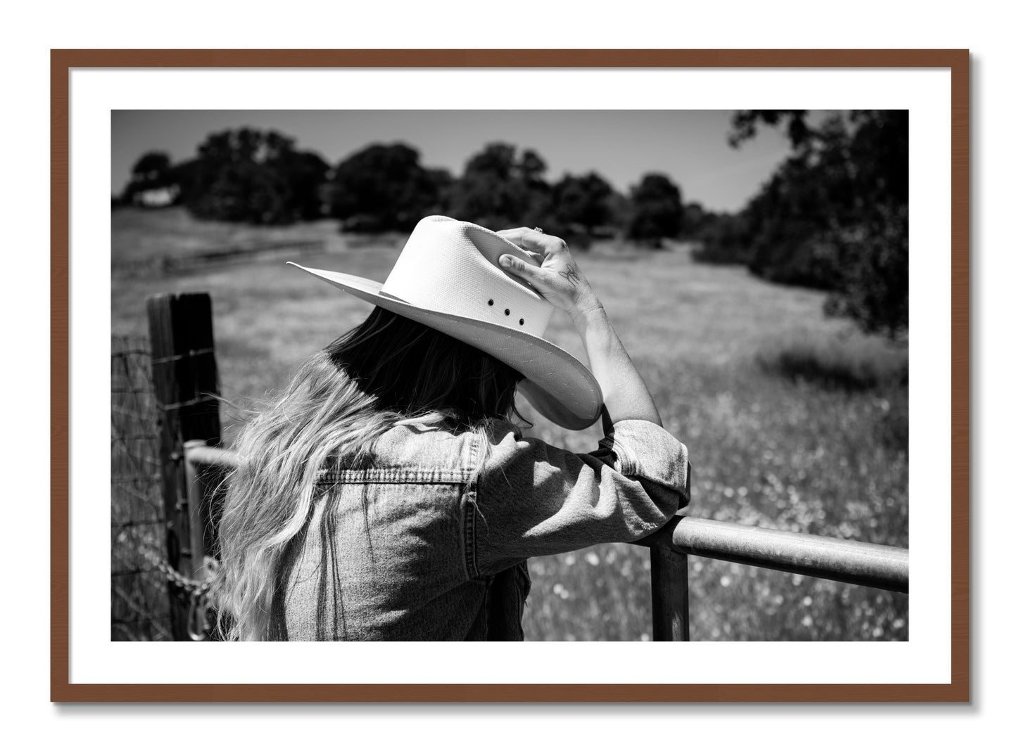 Framed photograph of Branded by Dylan Ozanich, Walnut frame, Borders