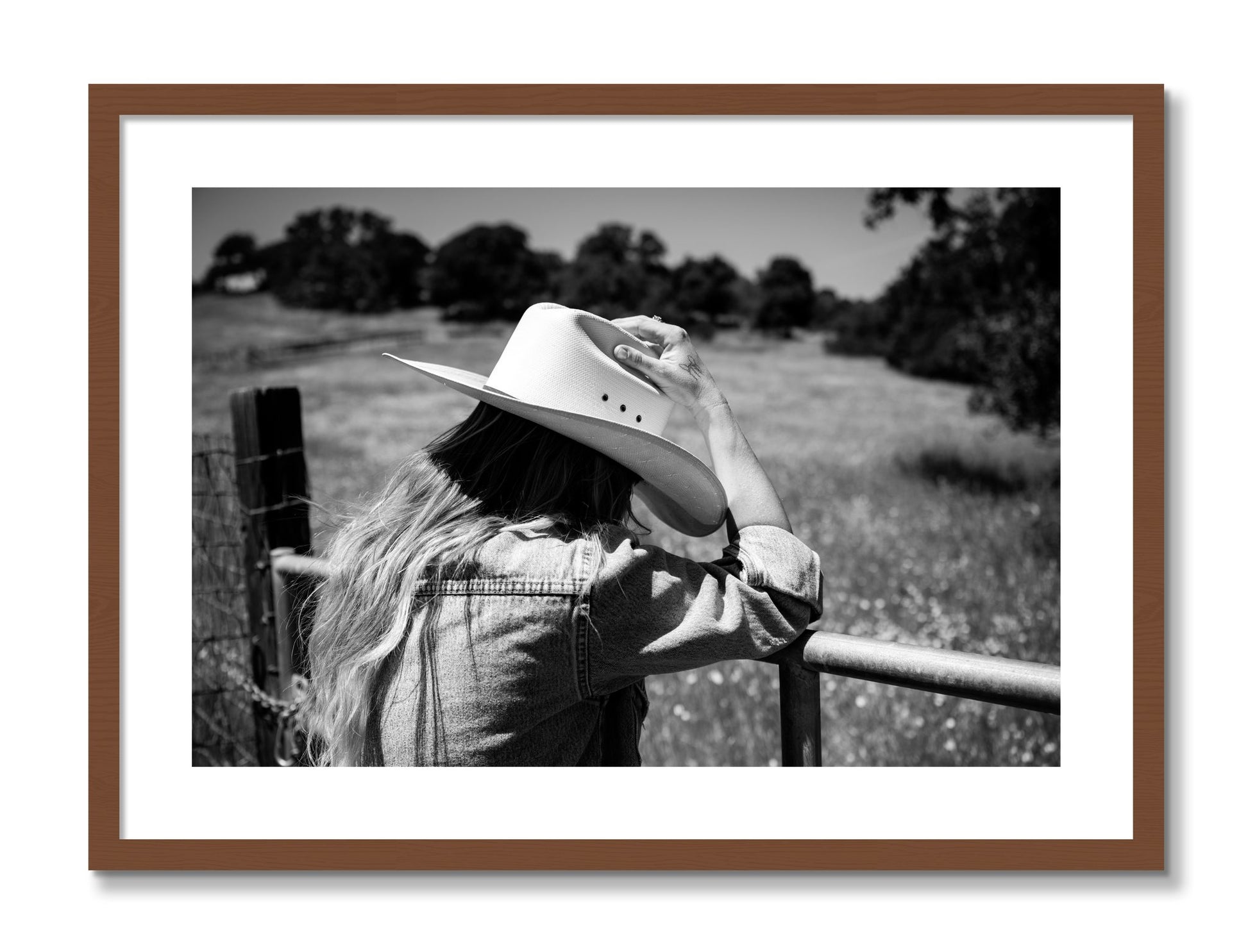 Framed photograph of Branded by Dylan Ozanich, Walnut frame, Borders